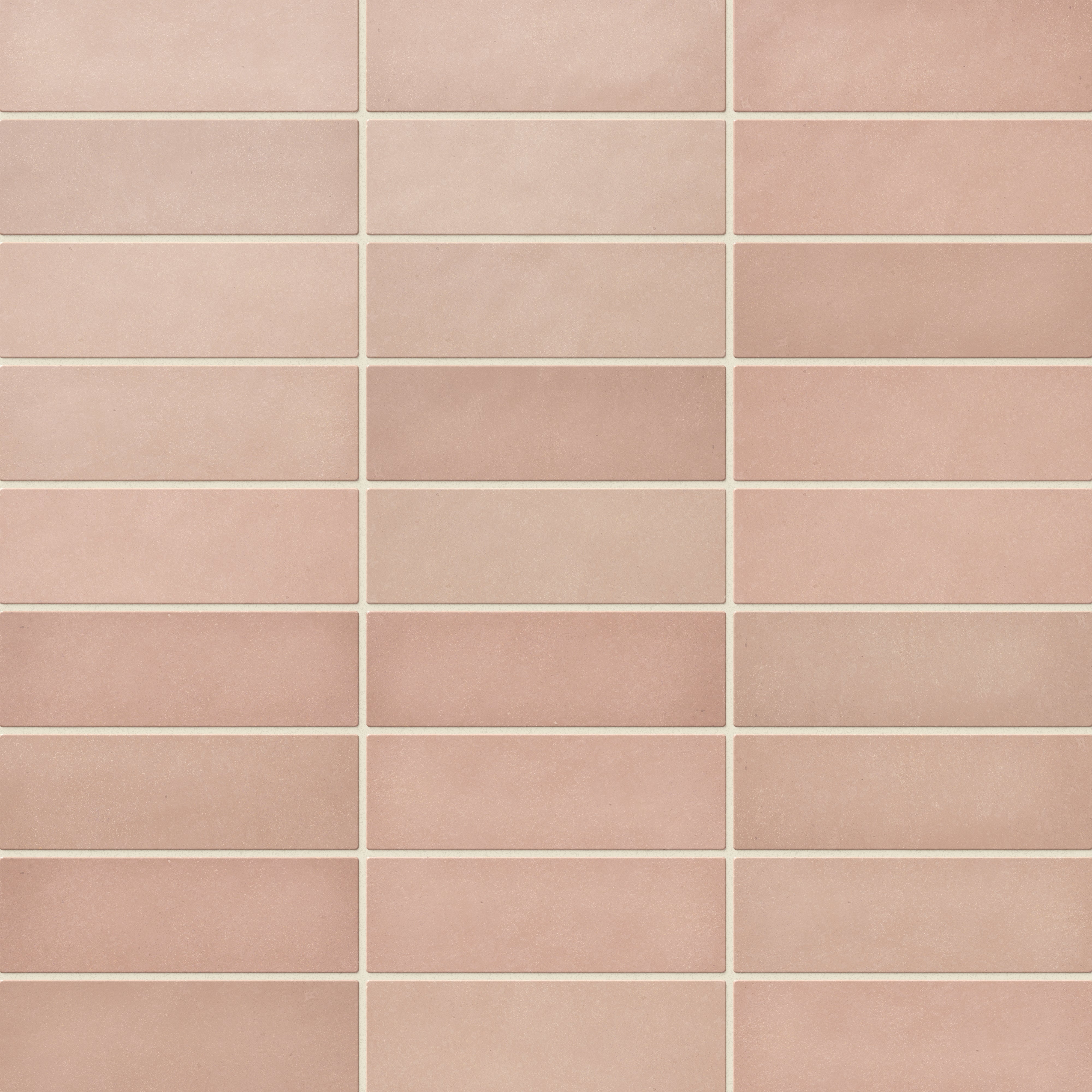 Ellie ceramic subway tiles in a warm matte finish, showcasing soft pink tones for a subtle and elegant design
