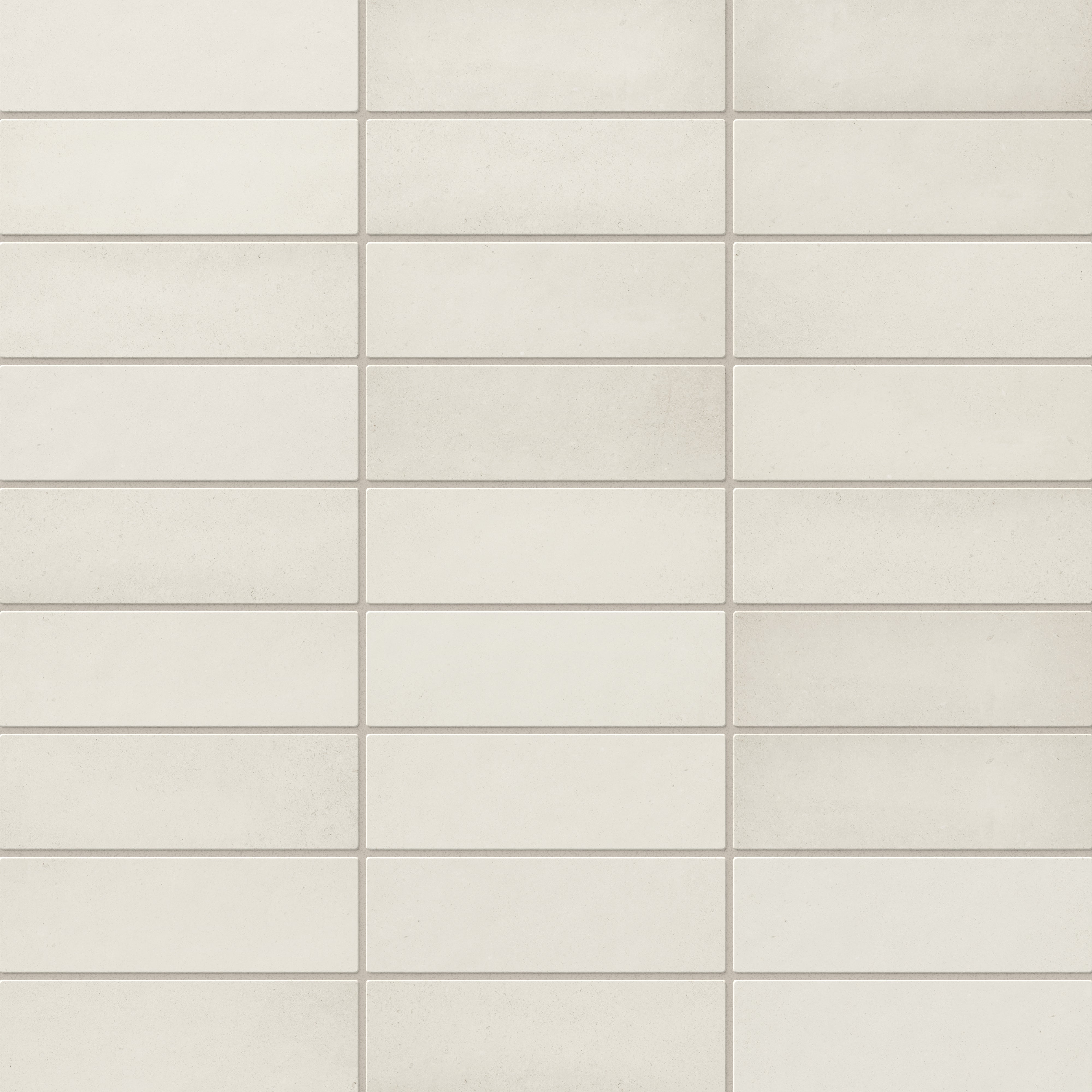 Ellie ceramic subway tiles in soft off-white tones with a matte finish, offering a timeless and versatile design