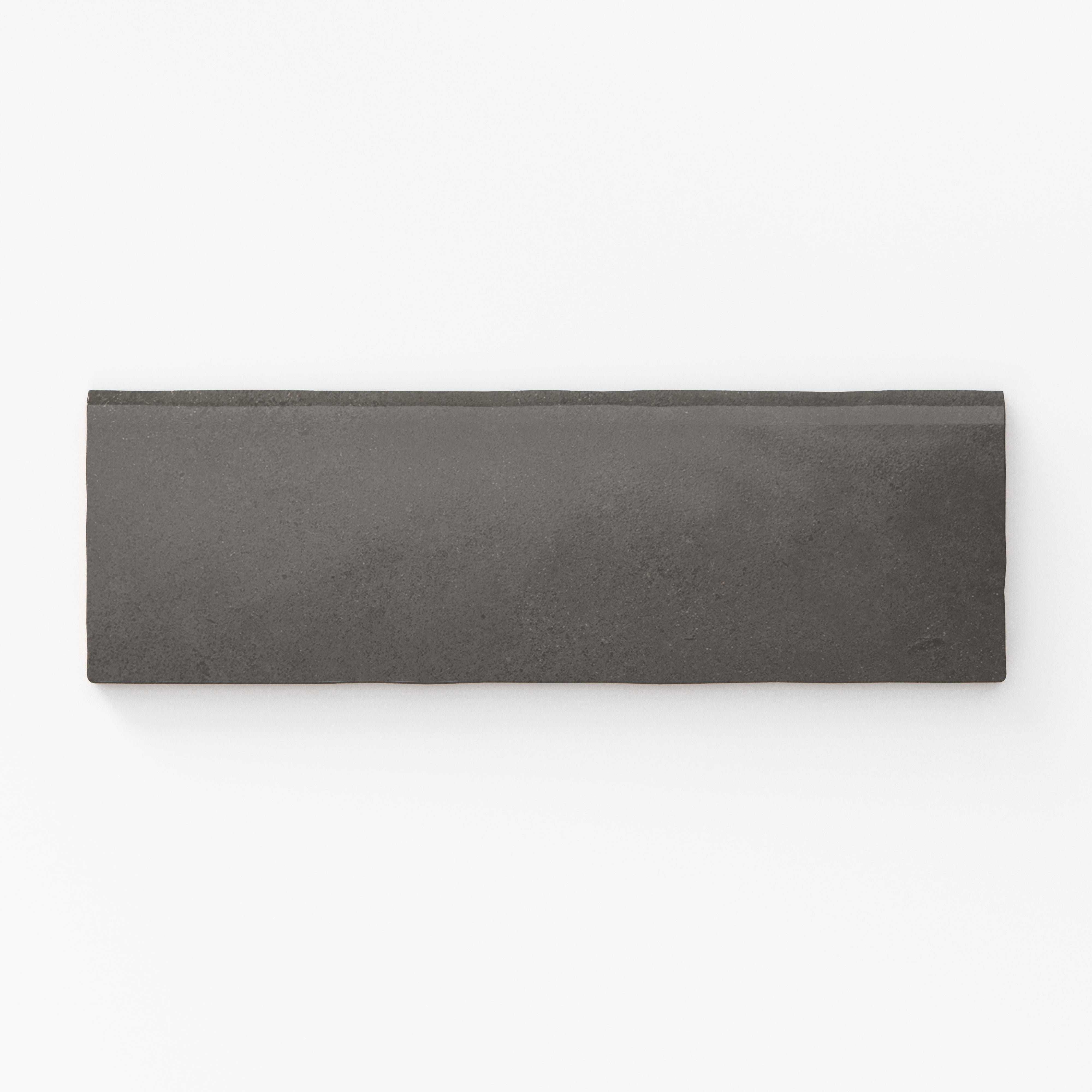 Dark grayish-brown bullnose tile featuring a sleek matte finish and refined modern design