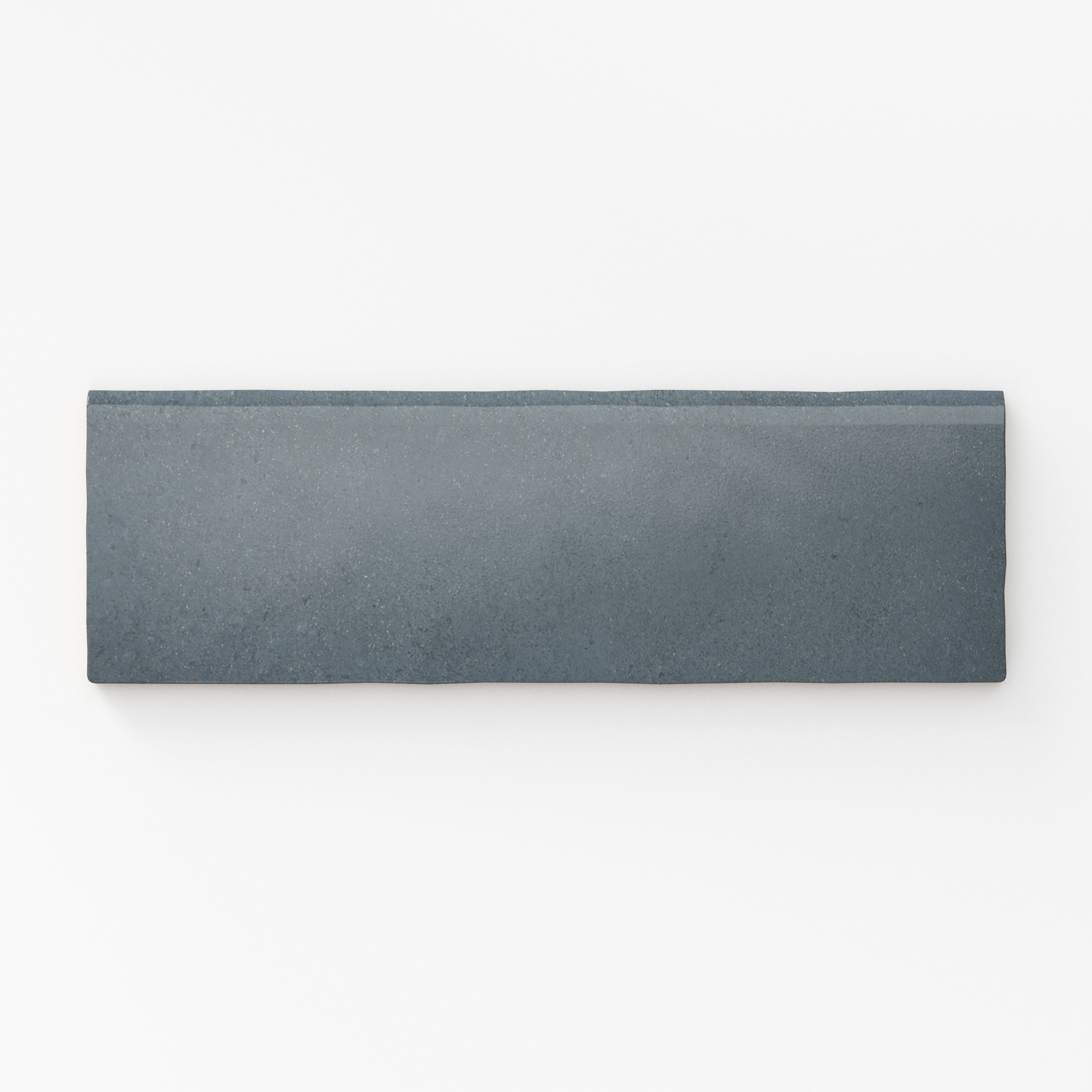 Rich denim-blue 2.5x8 matte tile with sleek bullnose edges, ideal for a contemporary finish