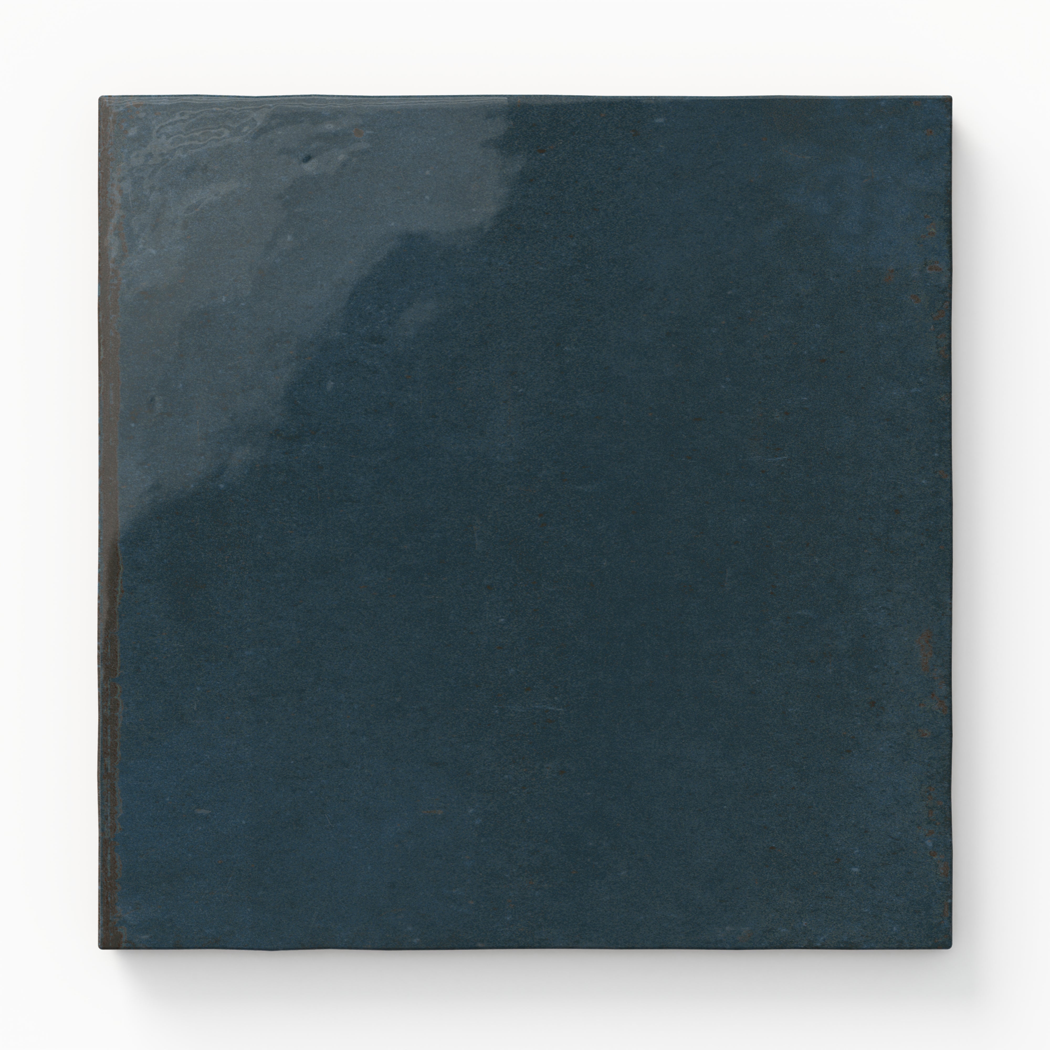 Square porcelain tile in deep navy blue with a glossy finish and subtle surface variation.