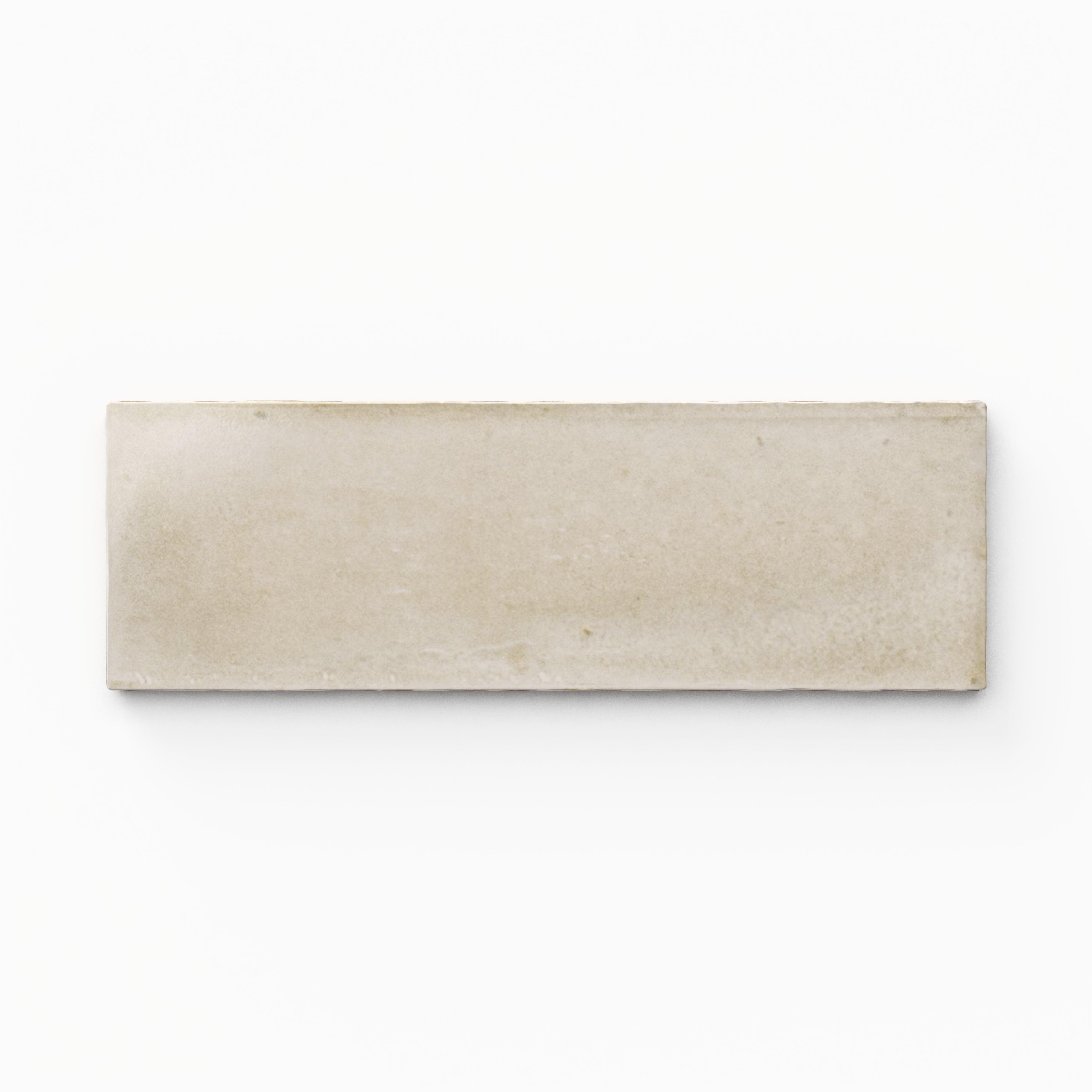 A 2x6 porcelain tile in beige, featuring a matte finish, soft tonal variation, and a clean, flat-edge profile.