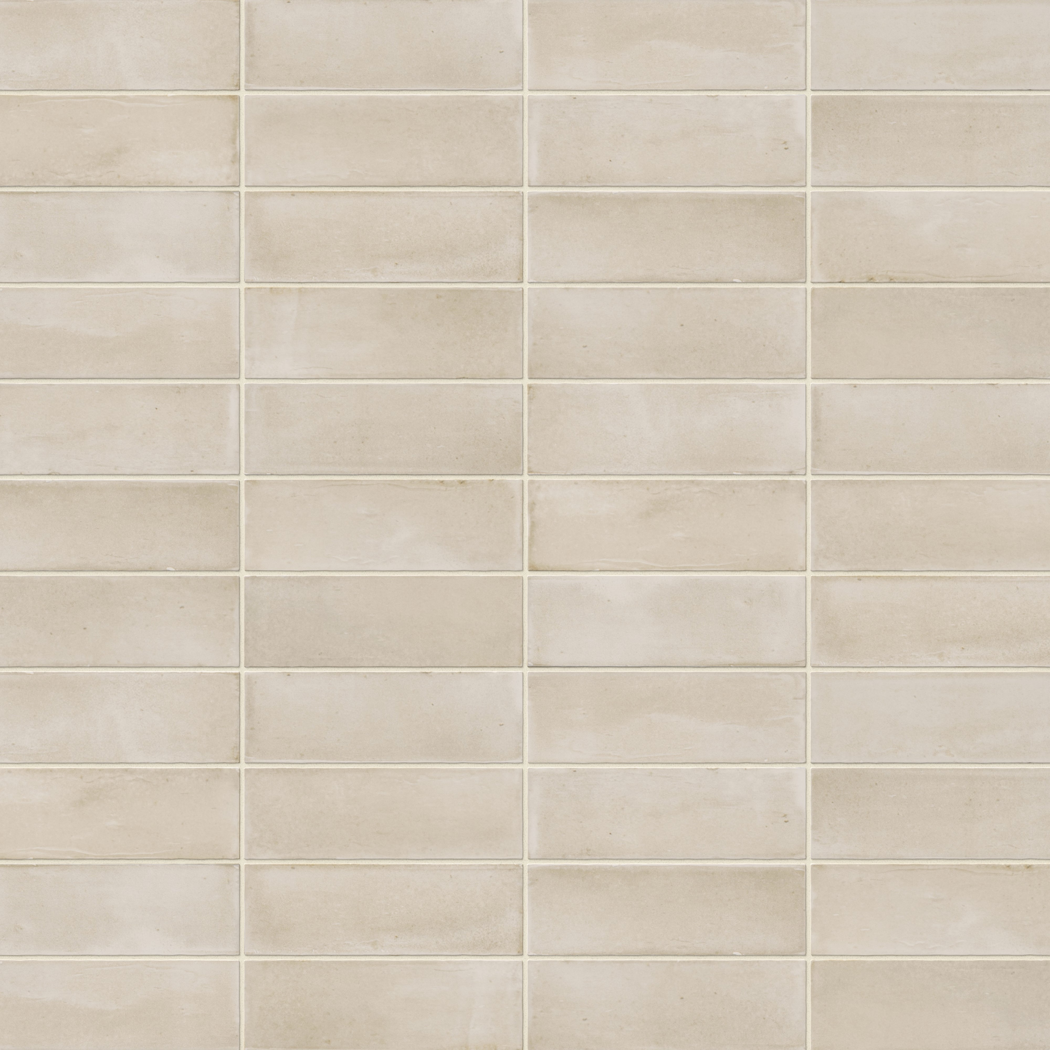A 2x6 porcelain subway tile in warm beige, featuring a matte finish, and a clean stacked layout with fine grout lines.