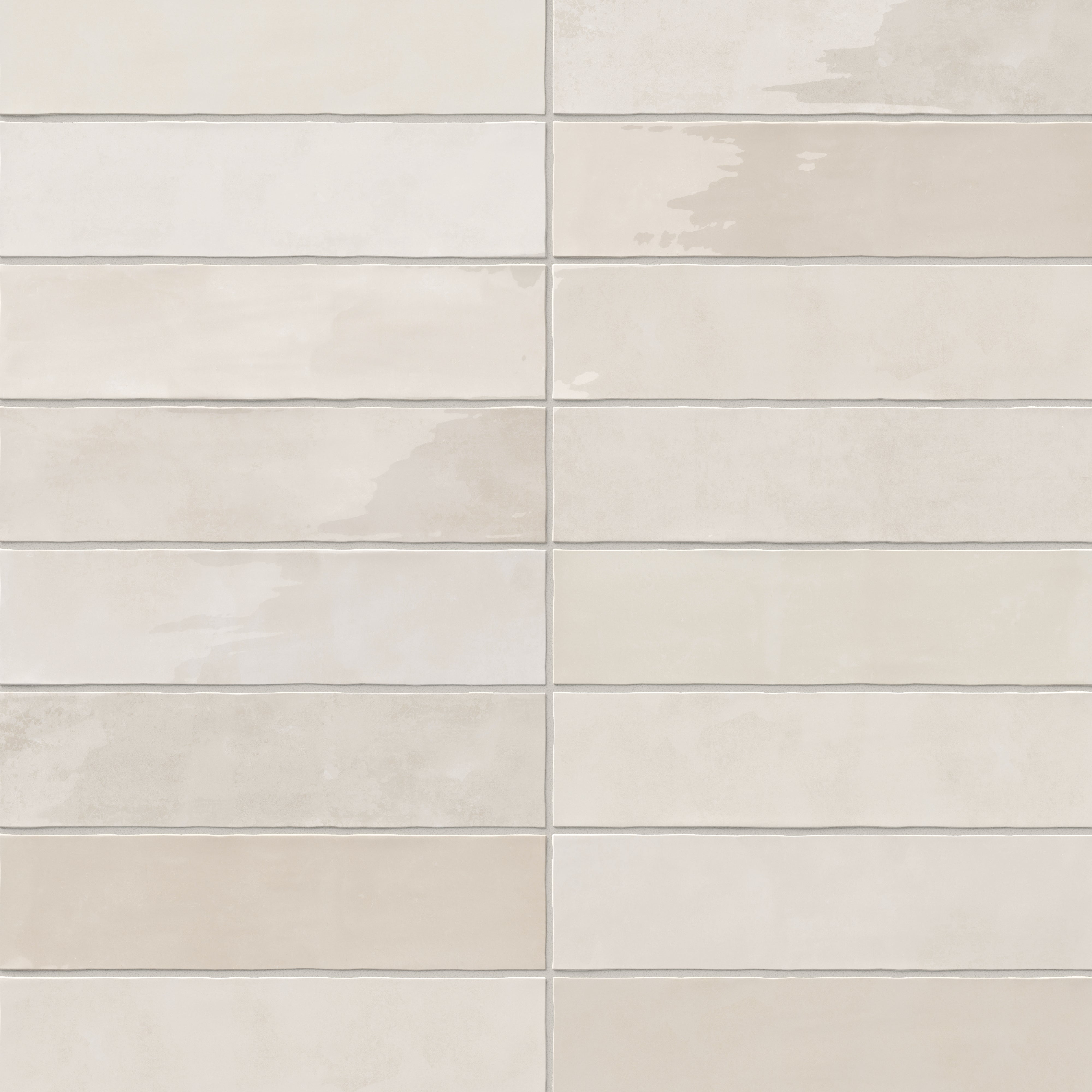 A 3x12 ceramic subway tile in off-white, featuring a glossy finish, and a clean stacked layout with fine grout lines.