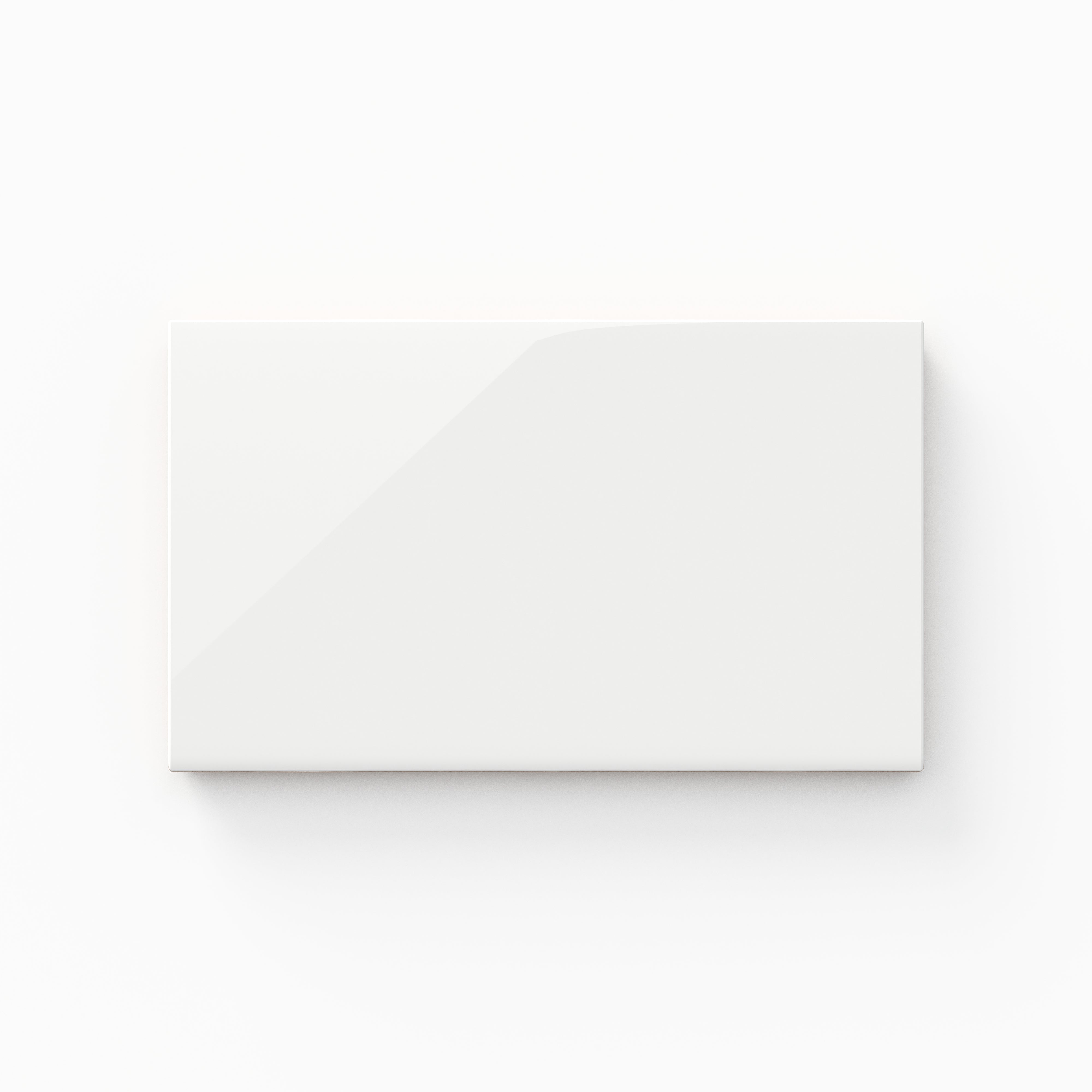 A 4x7 ceramic tile in white, featuring a glossy finish, reflective surface, and a sleek modern look.