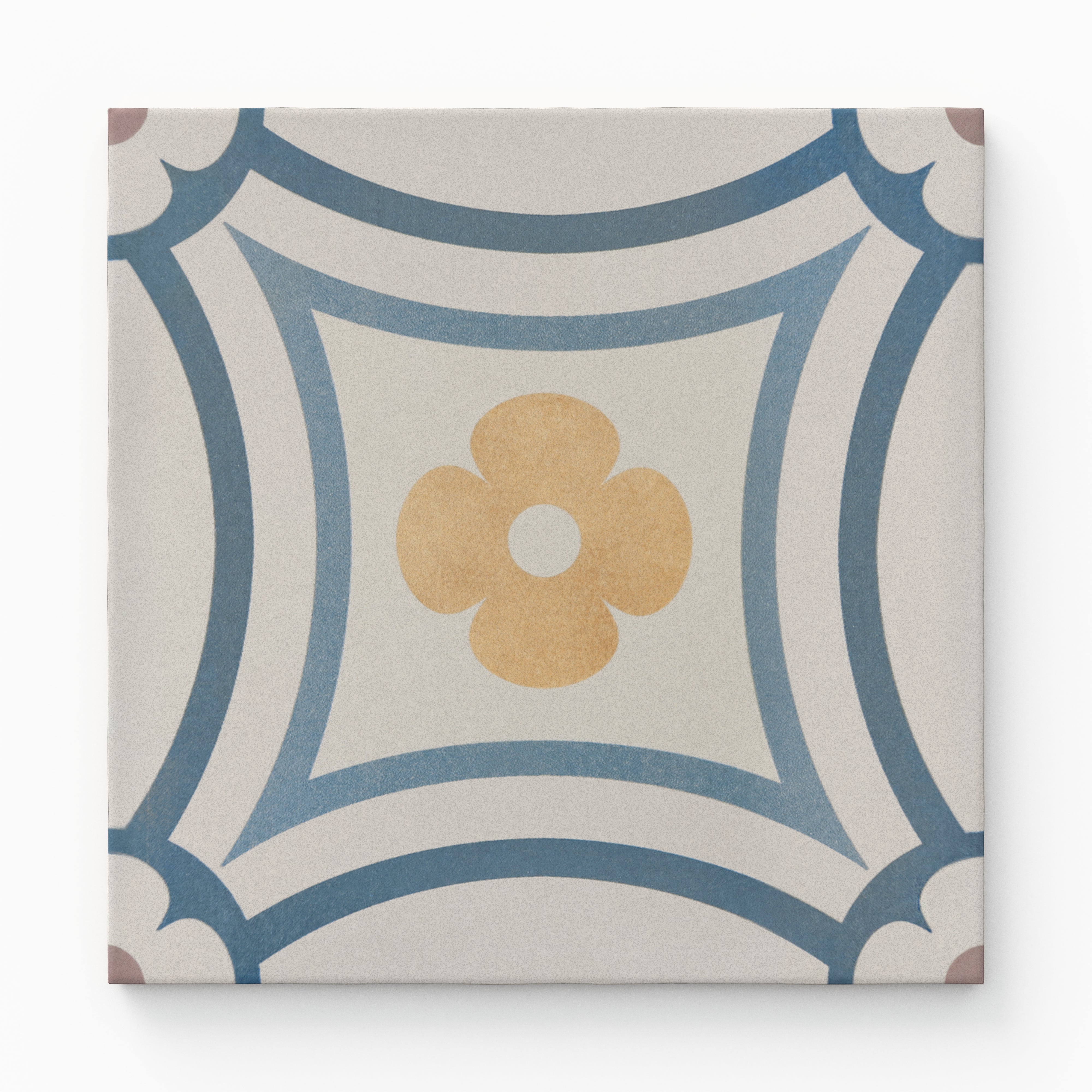 An 8x8 matte porcelain decorative tile with a vintage-inspired design, featuring a golden quatrefoil flower framed by curved blue lines and scalloped corner details.