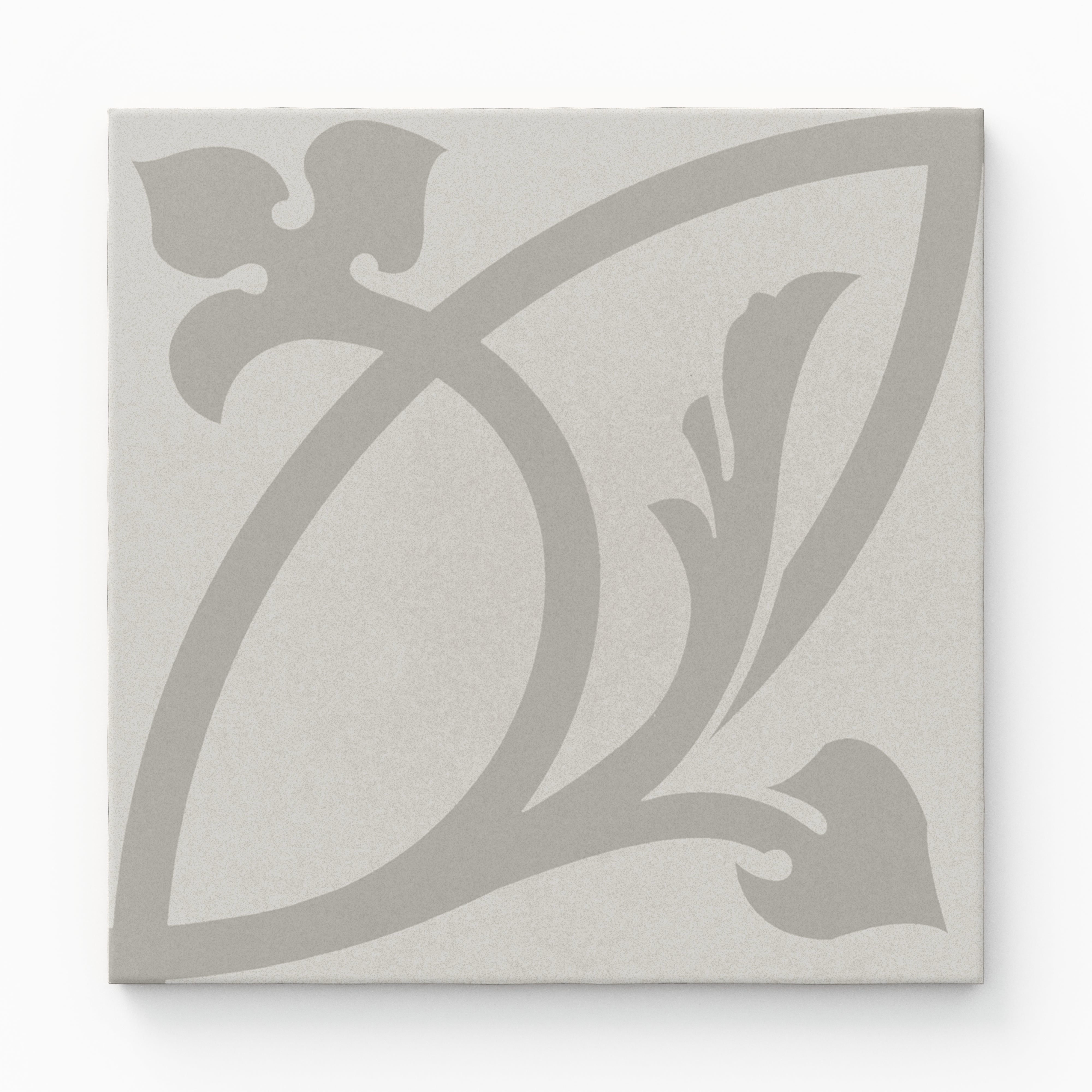 An 8x8 matte porcelain decorative tile in soft grey with a sweeping, stylized floral motif in a muted tone-on-tone palette for elegant, understated charm.