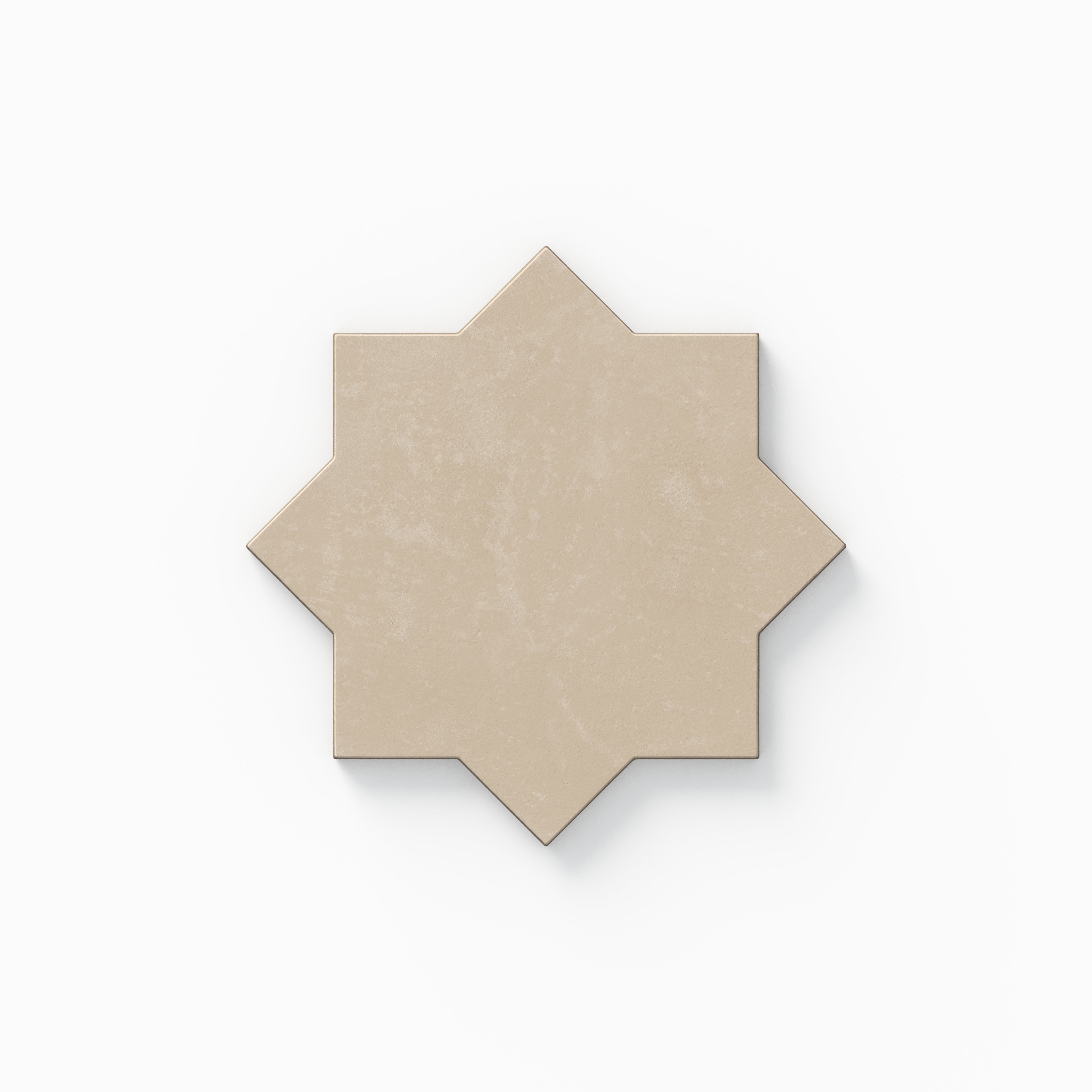This eight-point star tile from our Isabel 11x11 Matte Porcelain collection highlights warm beige coloring, gentle plaster-like texture, and a powdery surface with an organically aged feel.