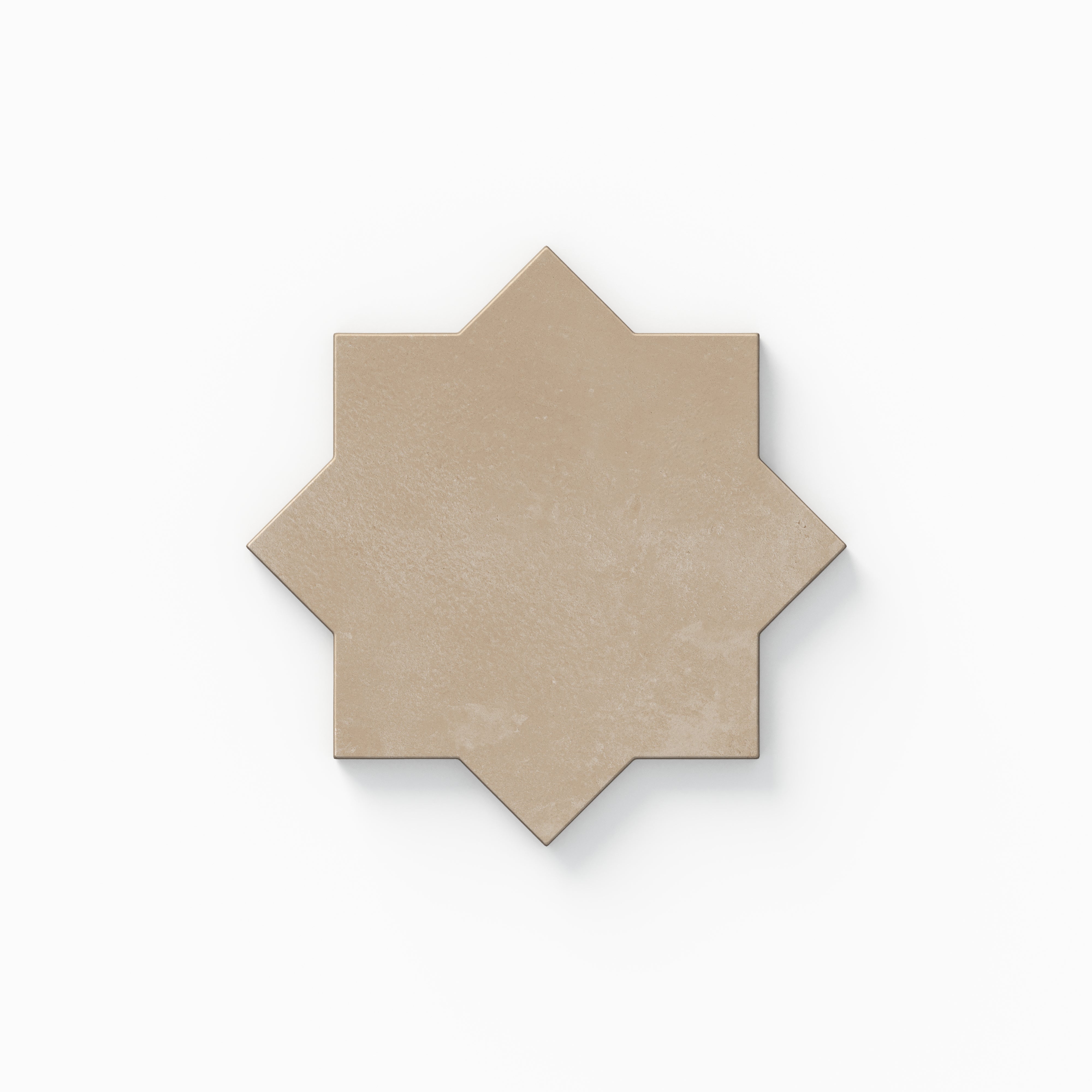 Part of our Isabel 11x11 Matte Porcelain Star and Cross set, this eight-point star tile shows light brown hues, soft cement texture, and a powdery finish inspired by aged terracotta.