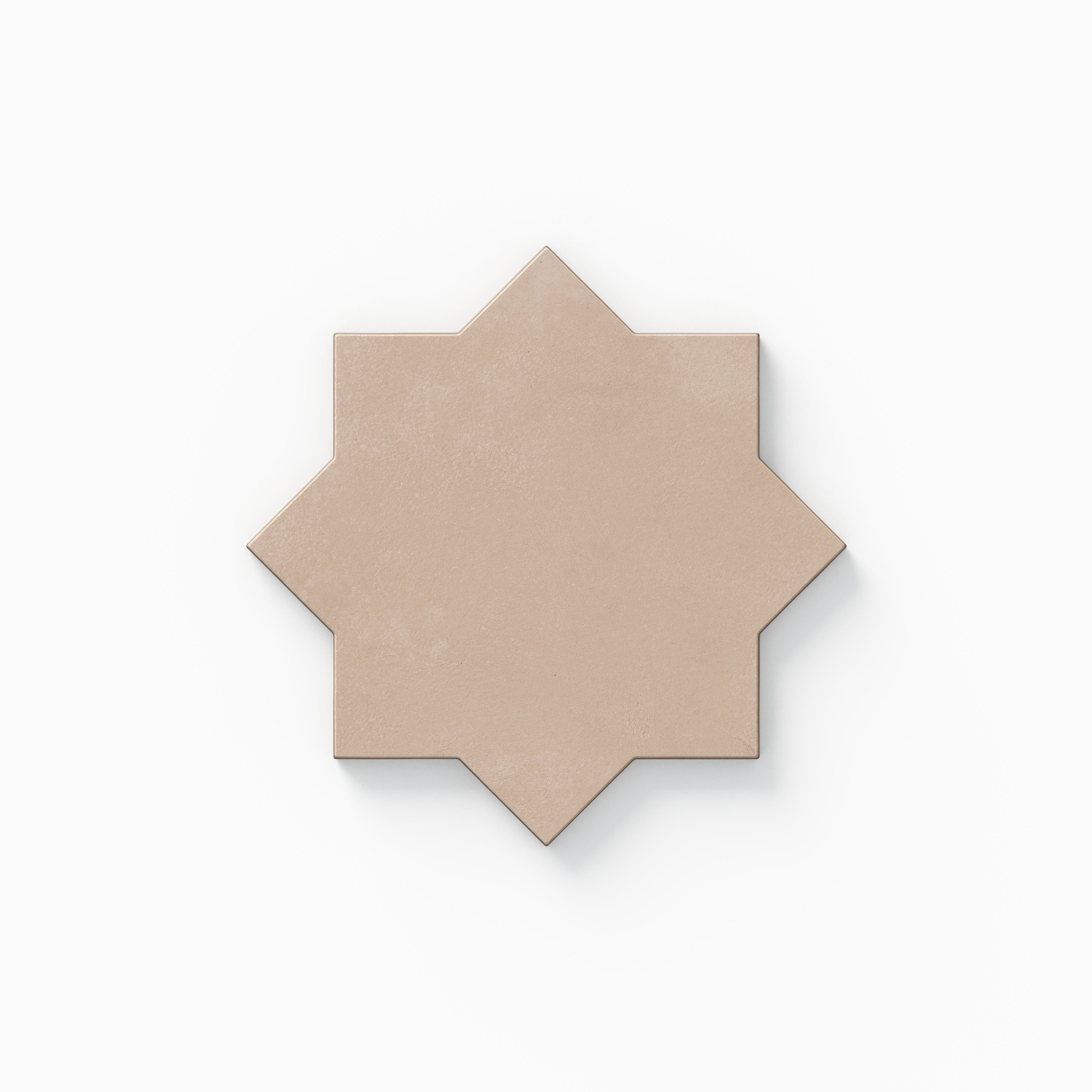 Part of our Isabel 11x11 Matte Porcelain Star and Cross set, this eight-point star tile shows beige hues with soft pink undertones, cement-like texture, and a powdery aged look.