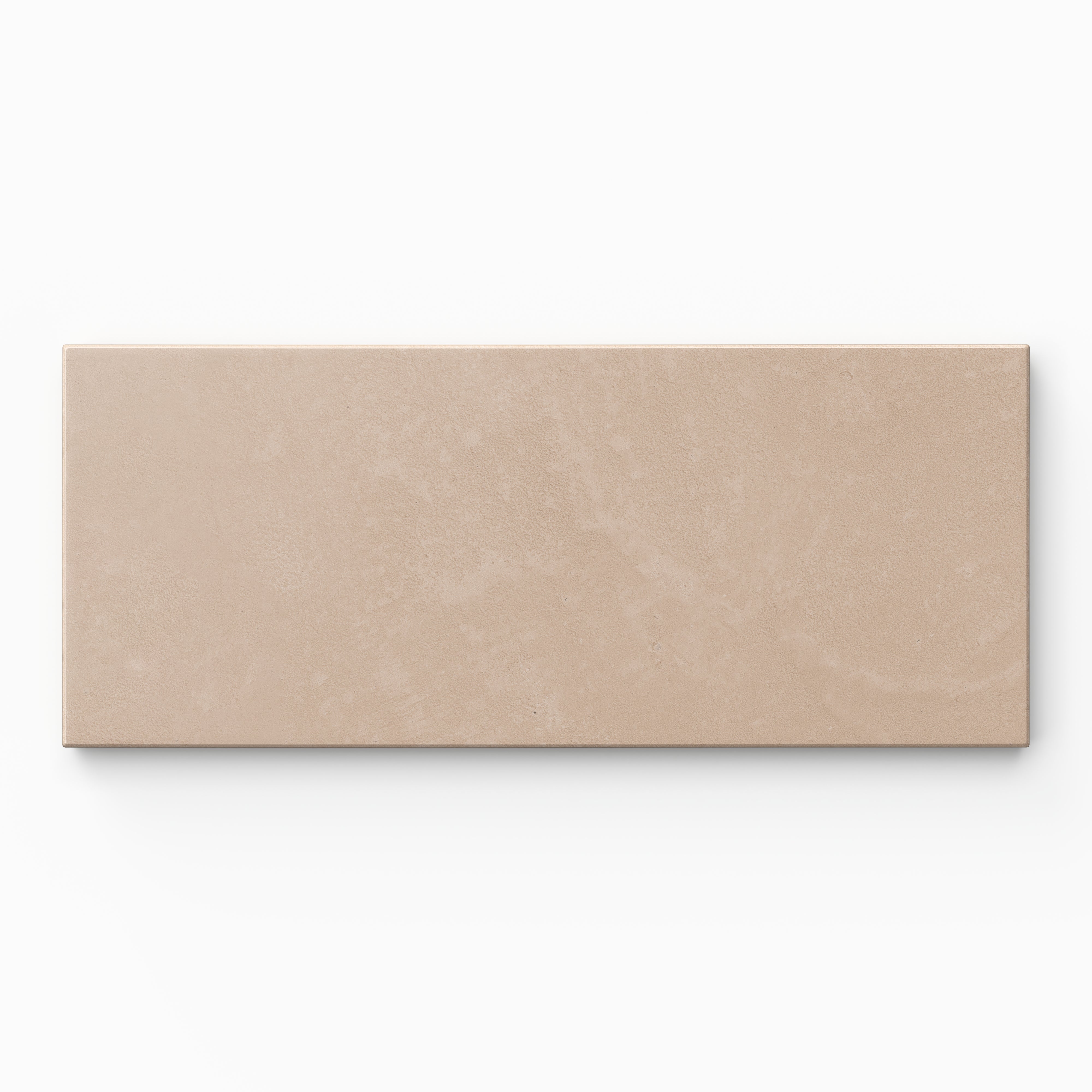 Isabel 2.5x12 Matte Porcelain Tile in Rosewood features soft beige tones with gentle pink undertones, an elongated subway shape, and a powdery matte glaze over subtle cement-plaster texture.