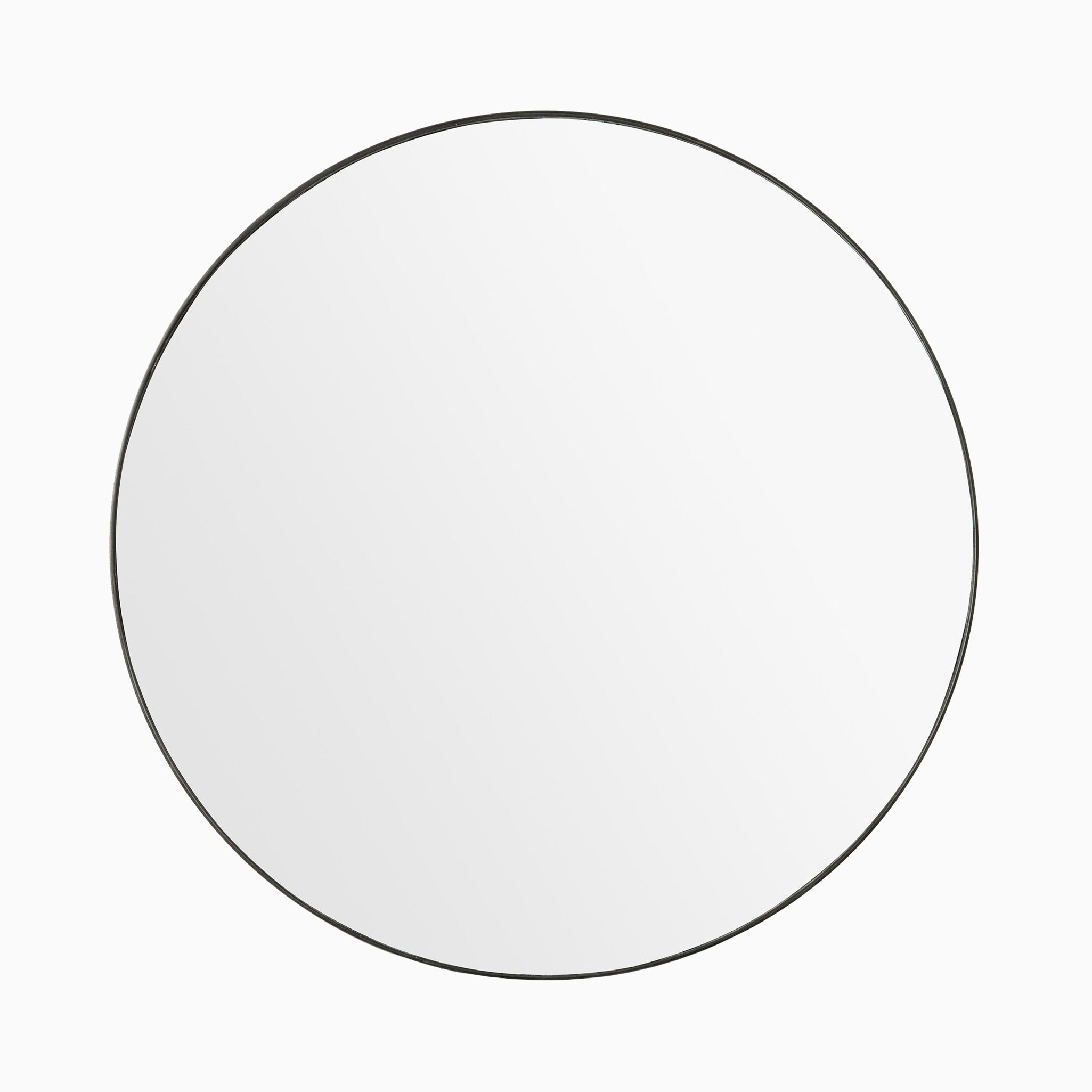 Minimalist round mirror with a slim rustic black frame, offering timeless versatility.