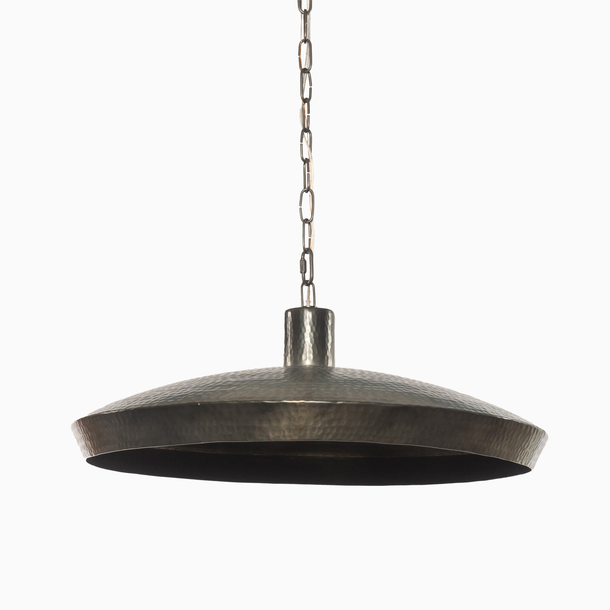 Pendant light with a wide, shallow hammered dark antique brass shade, suspended by a matching chain for an industrial-modern look.