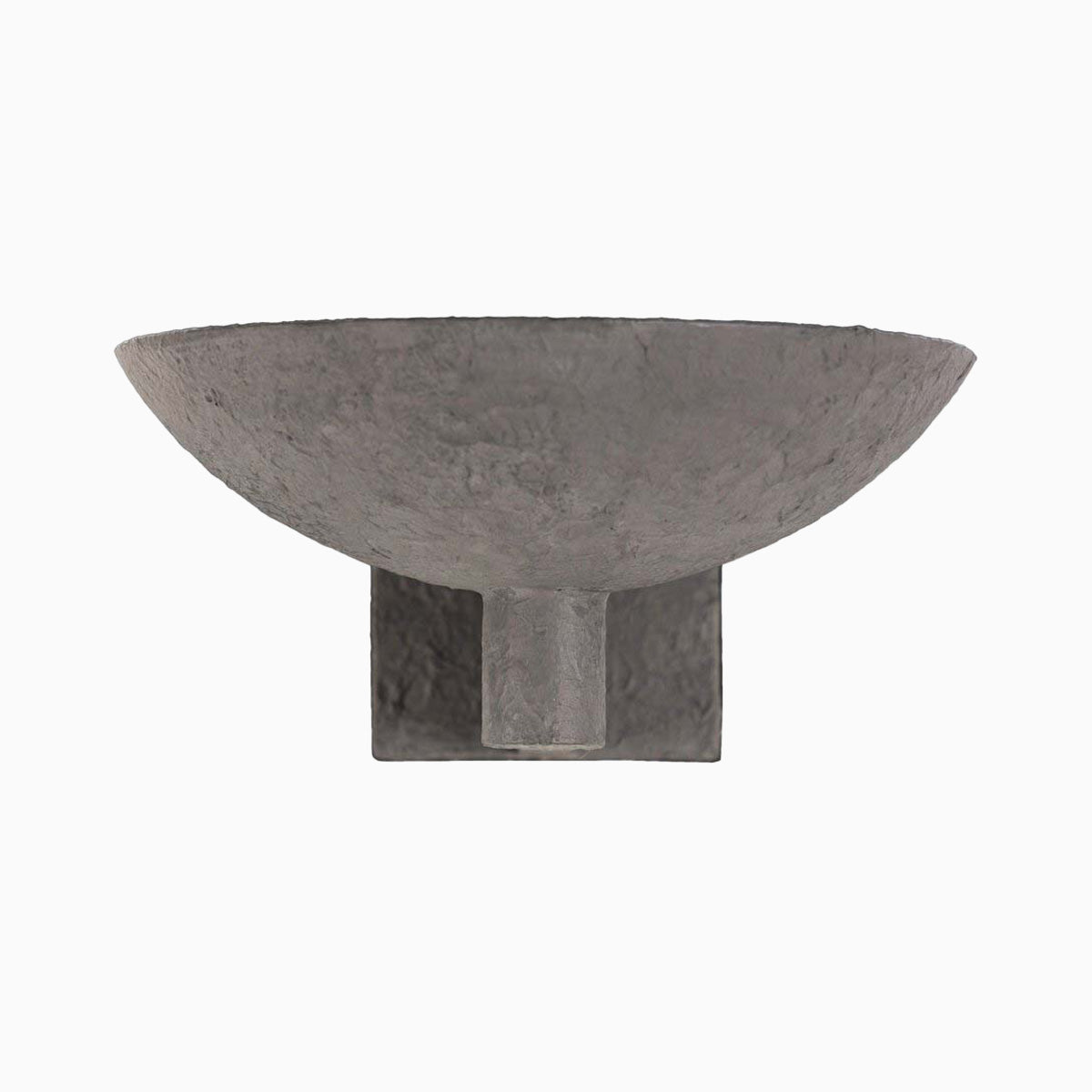 Matte black plaster sconce featuring a bold half-bowl design with sculptural pedestal mount.