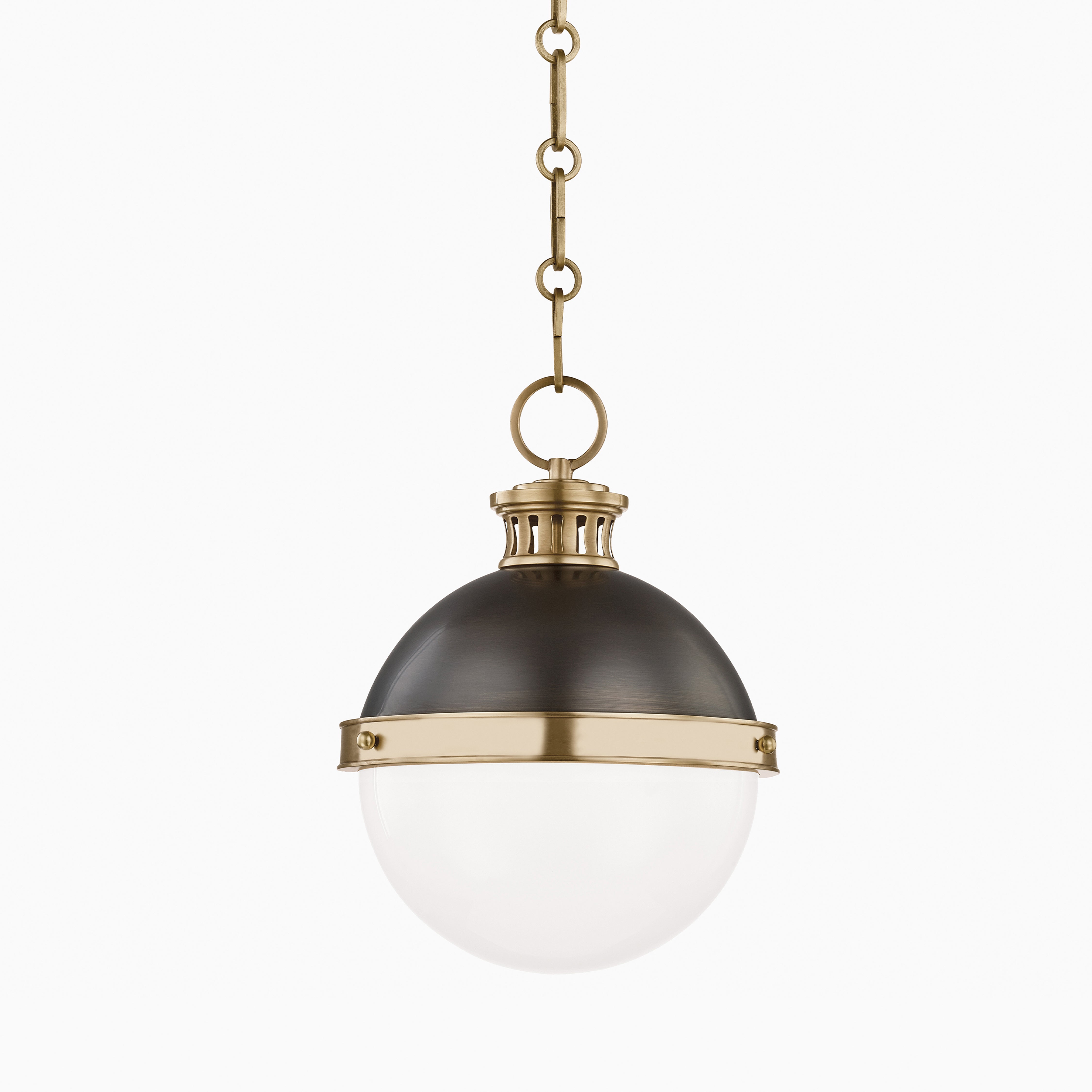 Globe pendant with aged brass and bronze finish, semi-opaque glass shade, vented collar, and sloped-ceiling mount.