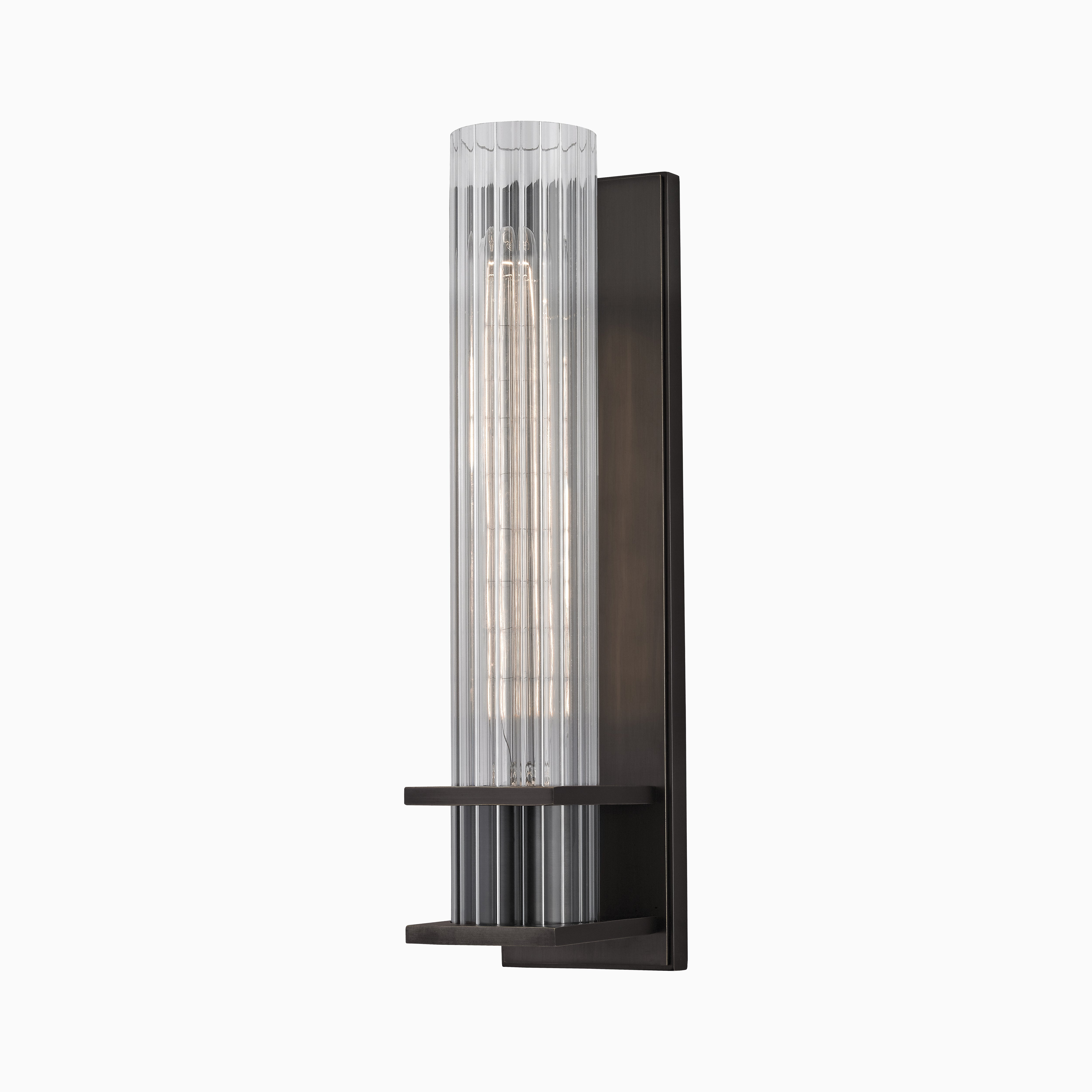 Wall sconce with vertically grooved glass diffuser and cornered bands on an old bronze backplate, casting a chic, textured glow.