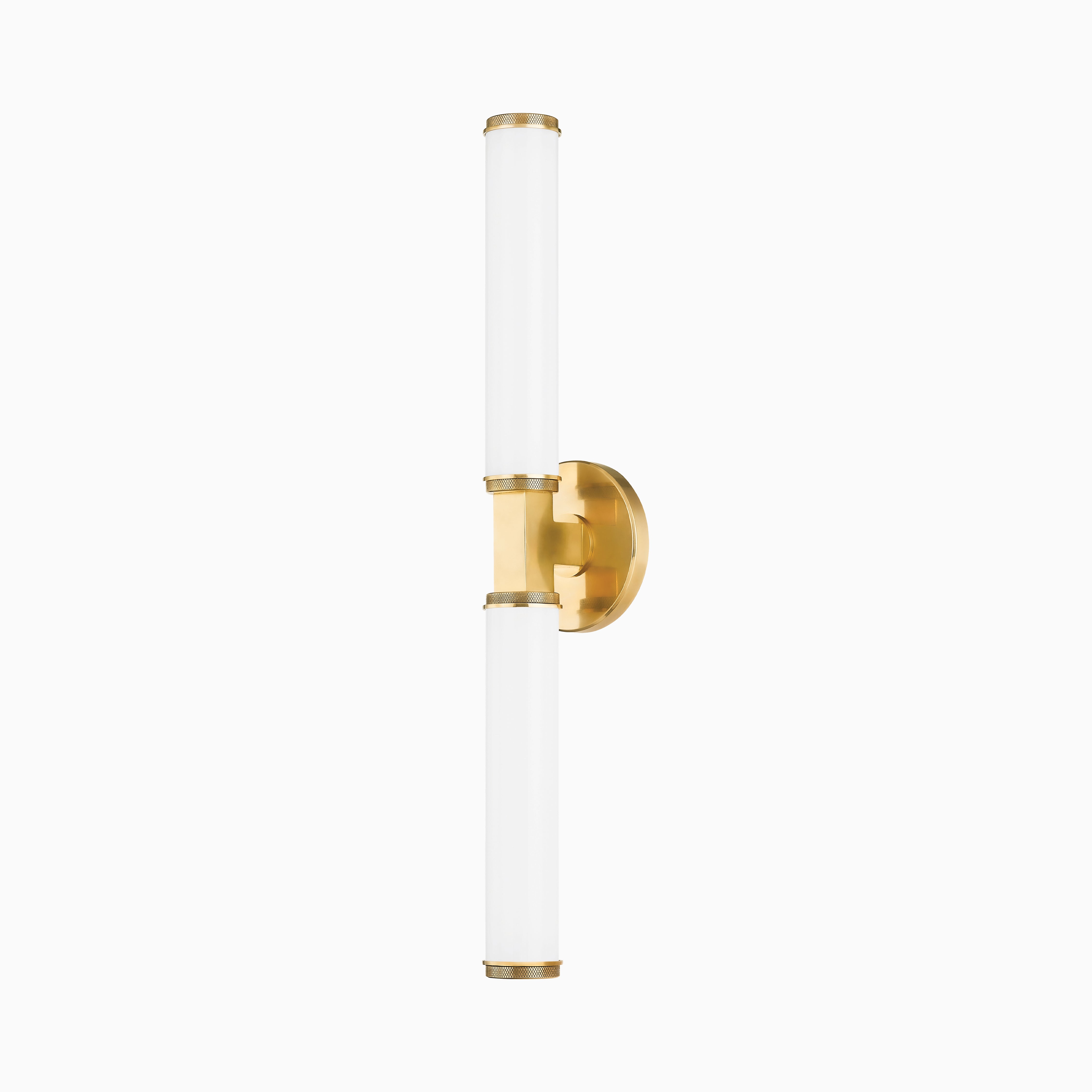Sleek vertical wall sconce with dual cylindrical white glass cylinder lights and a central brass mount for modern symmetry