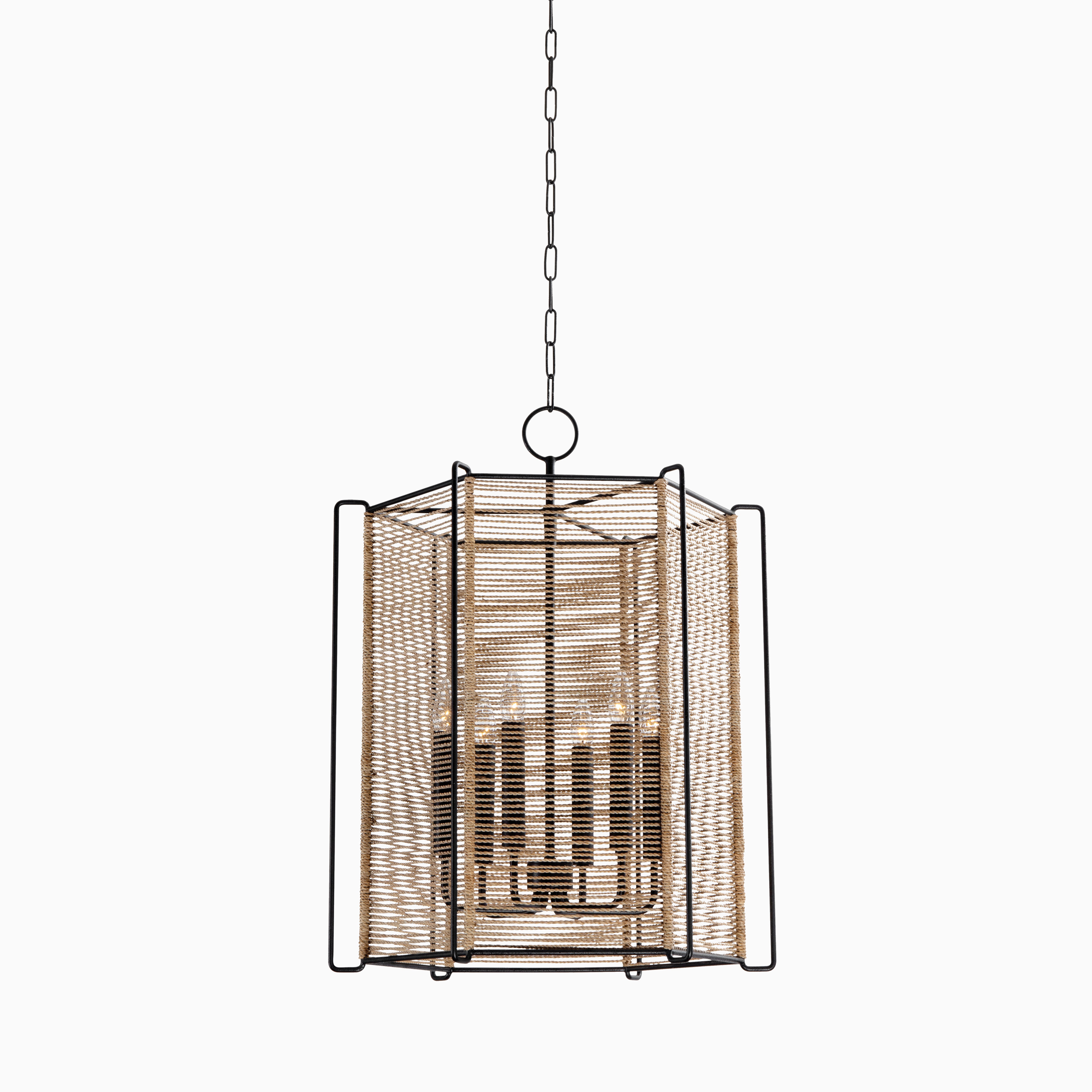 Textured black lantern with geometric frame and woven rope detailing, showcasing a layered design that blends rustic and modern style.