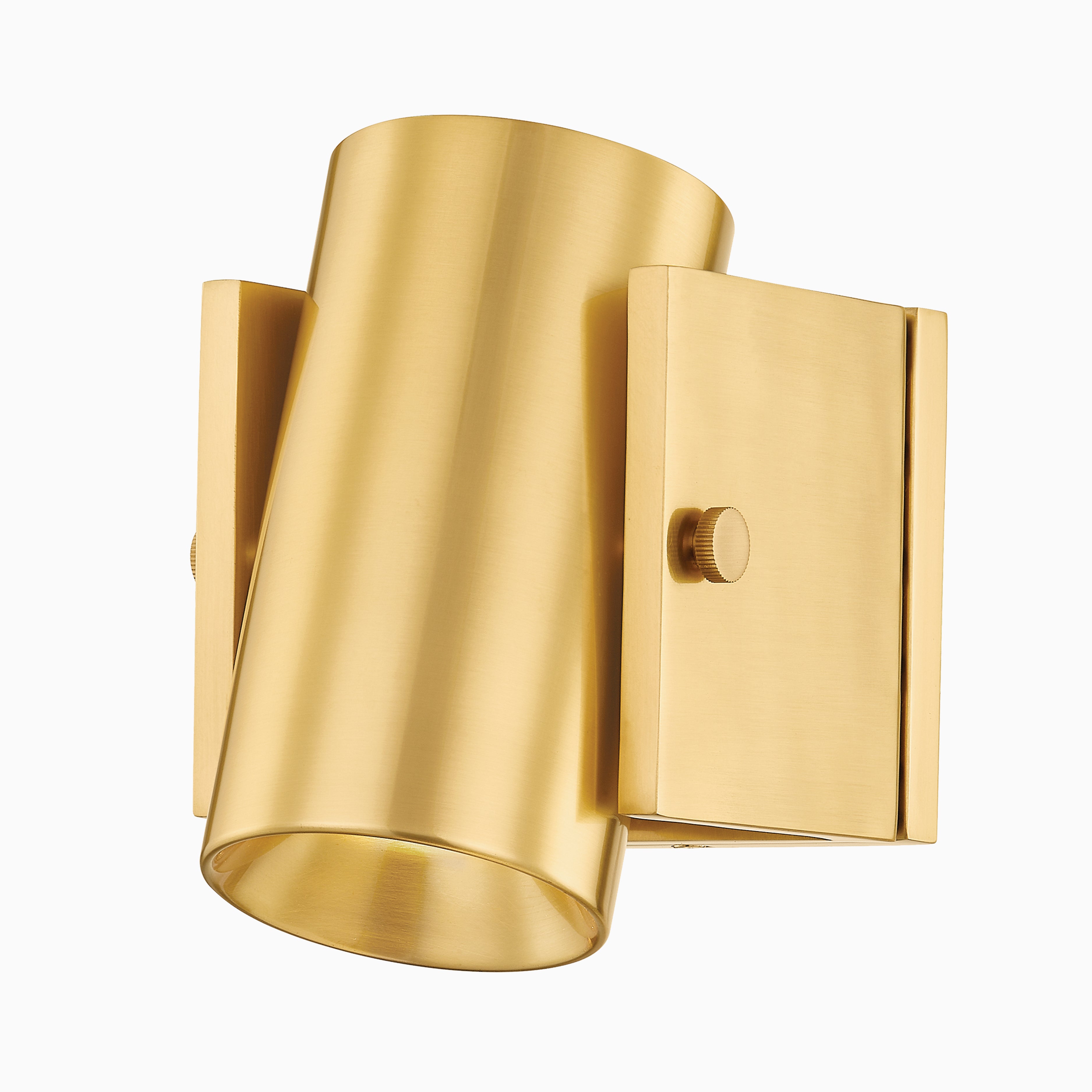 Adjustable spotlight sconce in aged brass with a bold cylindrical form for modern directional lighting.