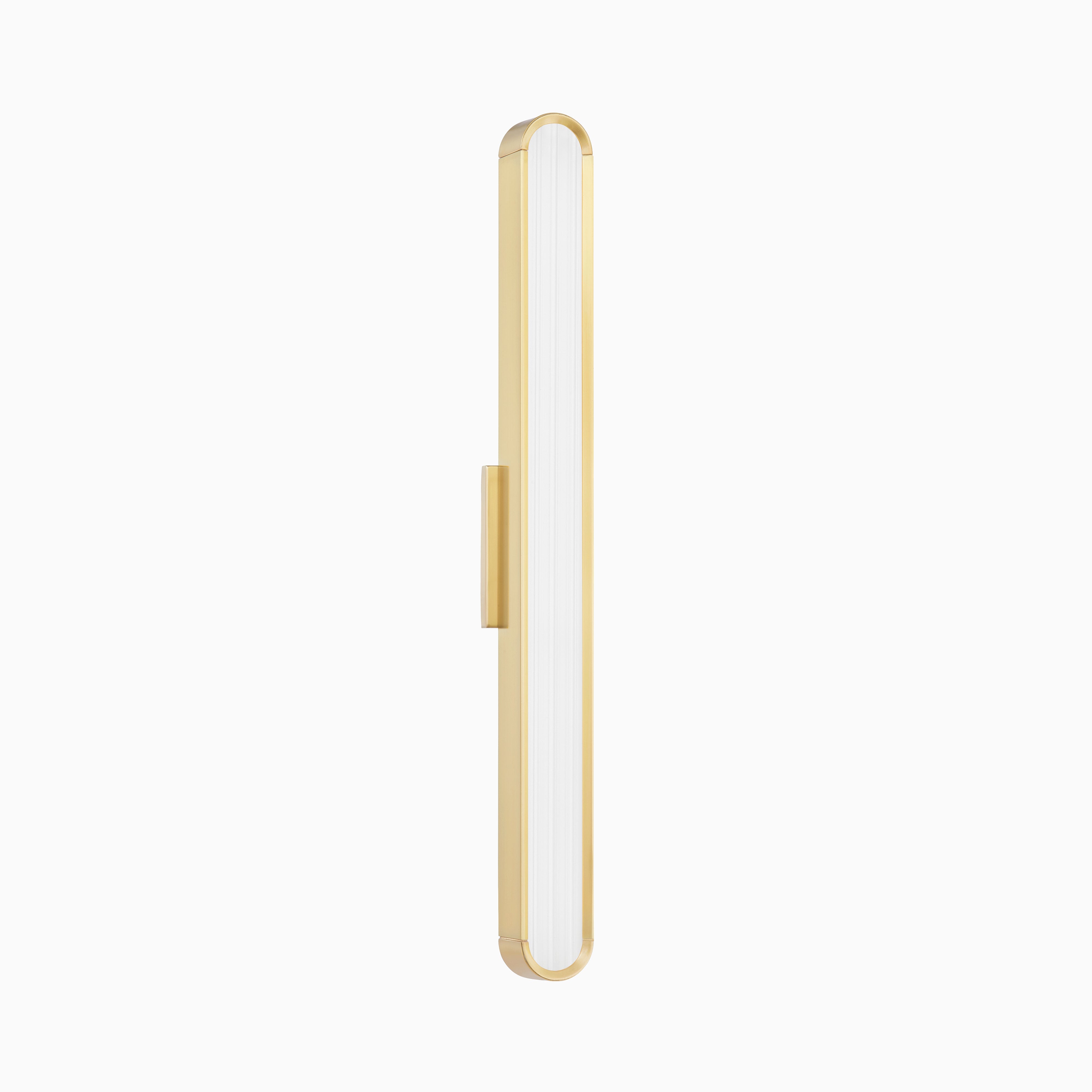 Slim gold wall sconce with a tall frosted glass shade, bringing soft, balanced lighting and a touch of warmth to modern spaces.