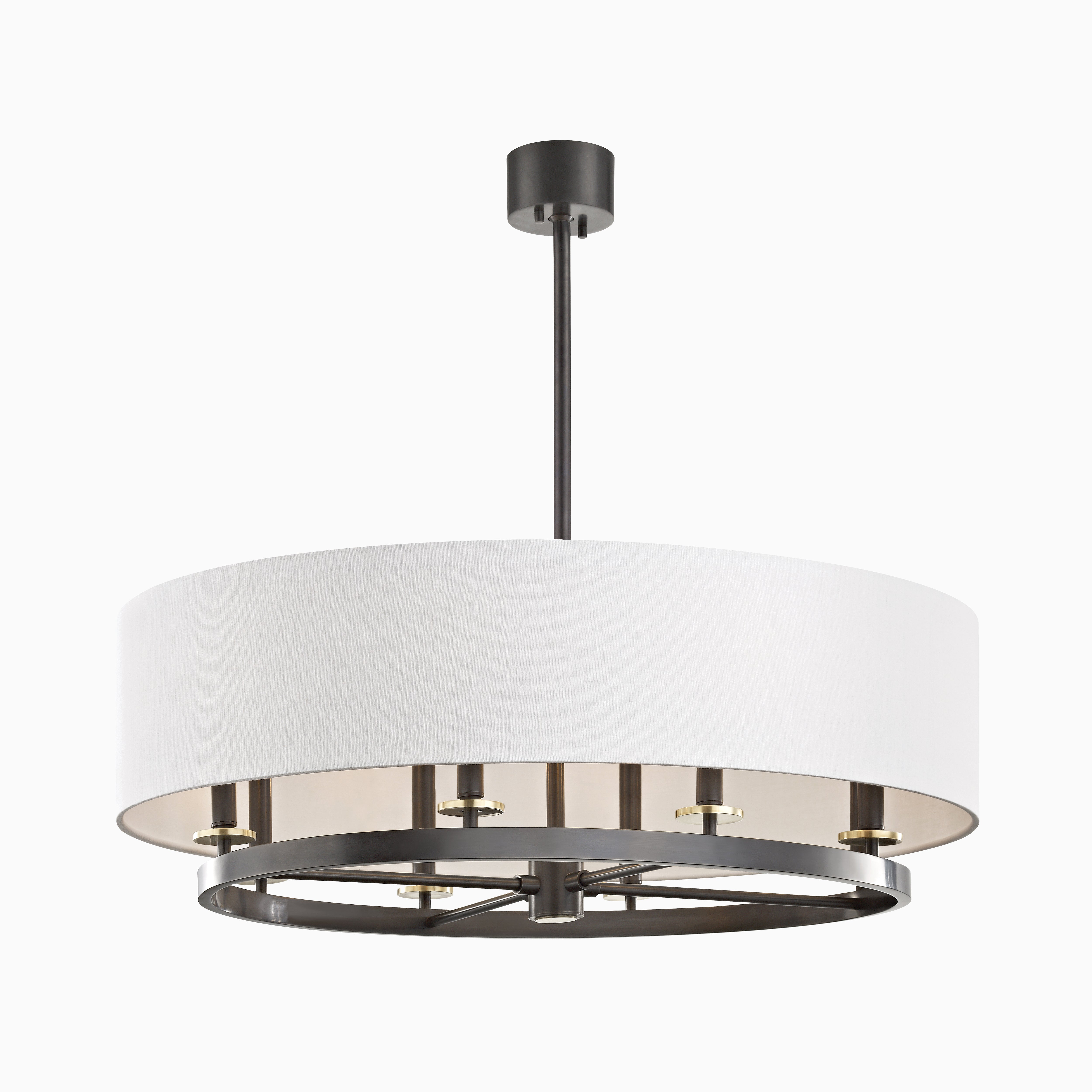Drum pendant with an off-white linen shade and black aged bronze frame, blending soft ambient light with bold, modern contrast.
