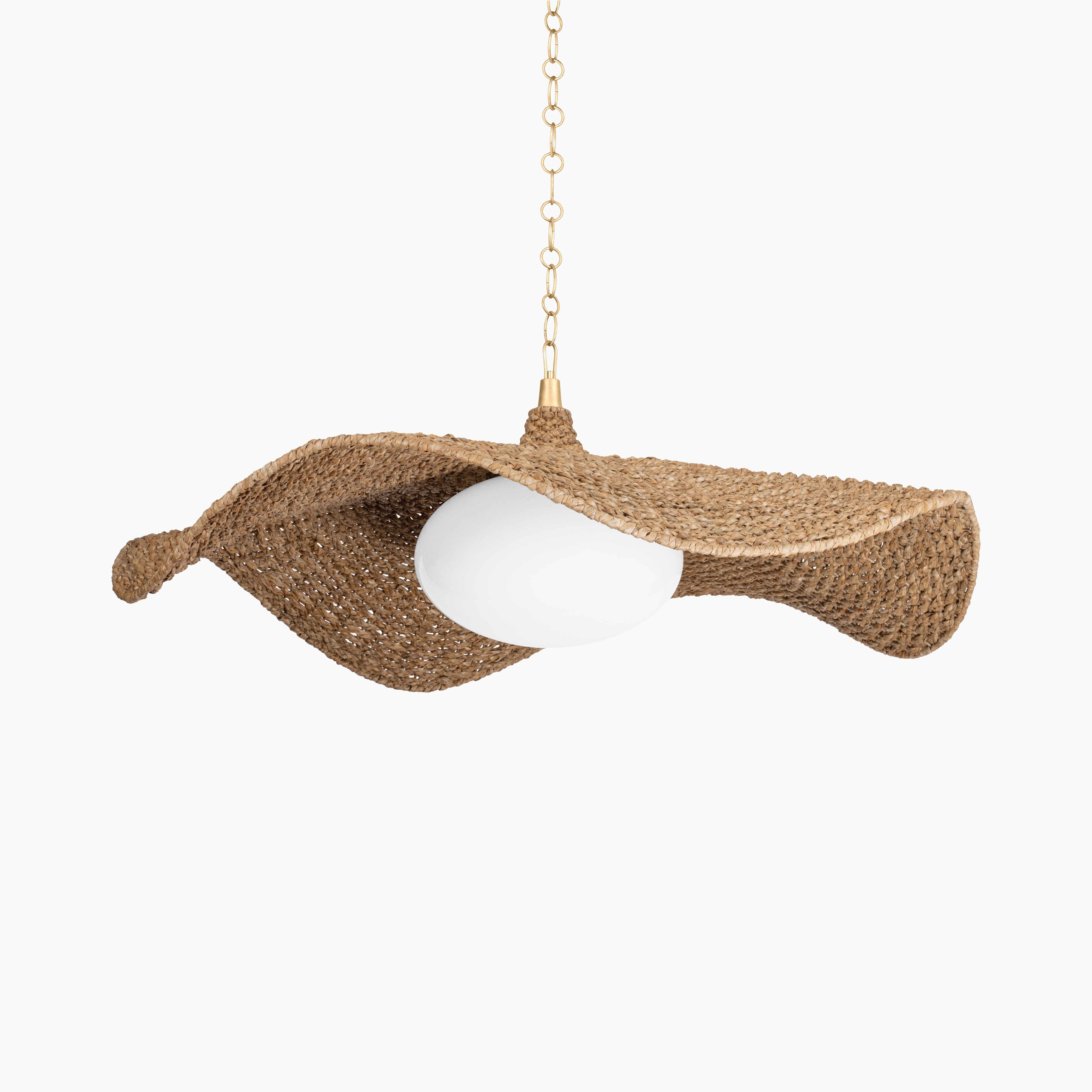 Whimsical chandelier with woven Abaca canopy and white globe light, suspended by a gold chain for coastal charm.
