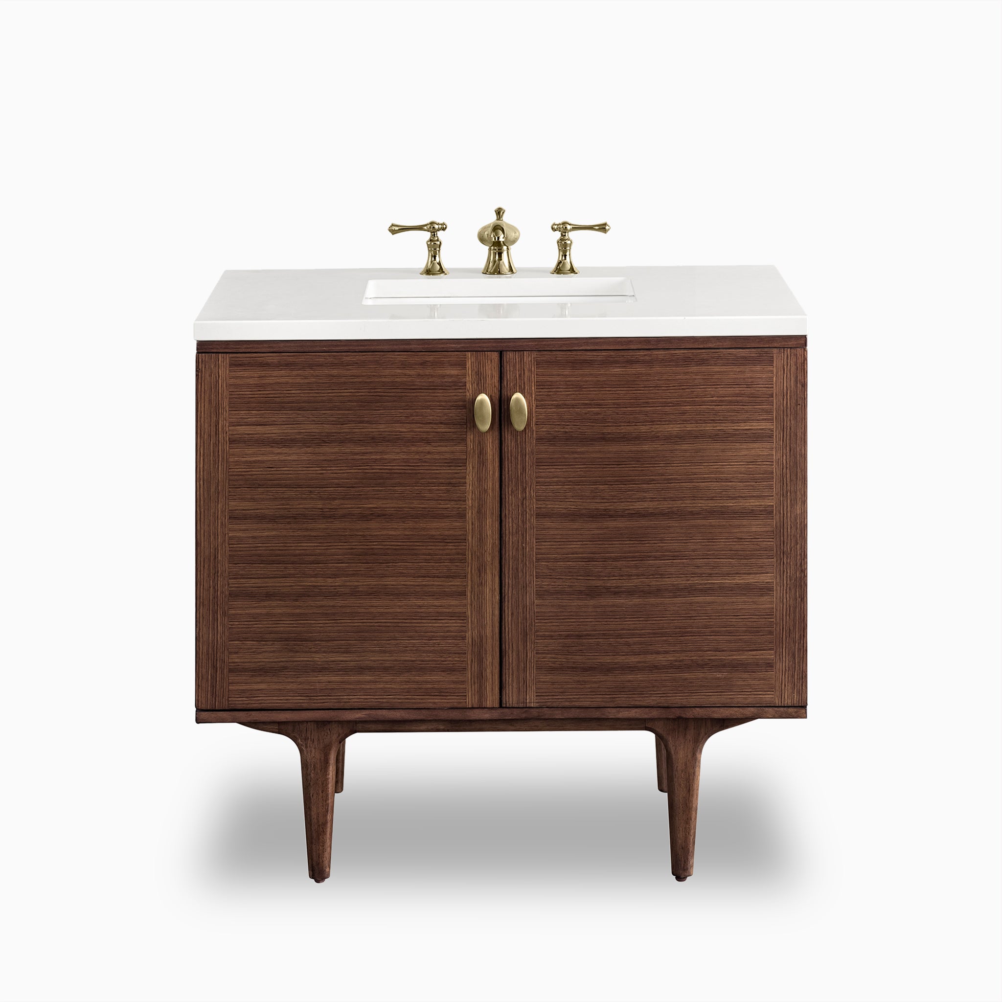 36" single vanity in mid-century walnut with white zeus quartz top, brass hardware, and fluted double doors on tapered legs.