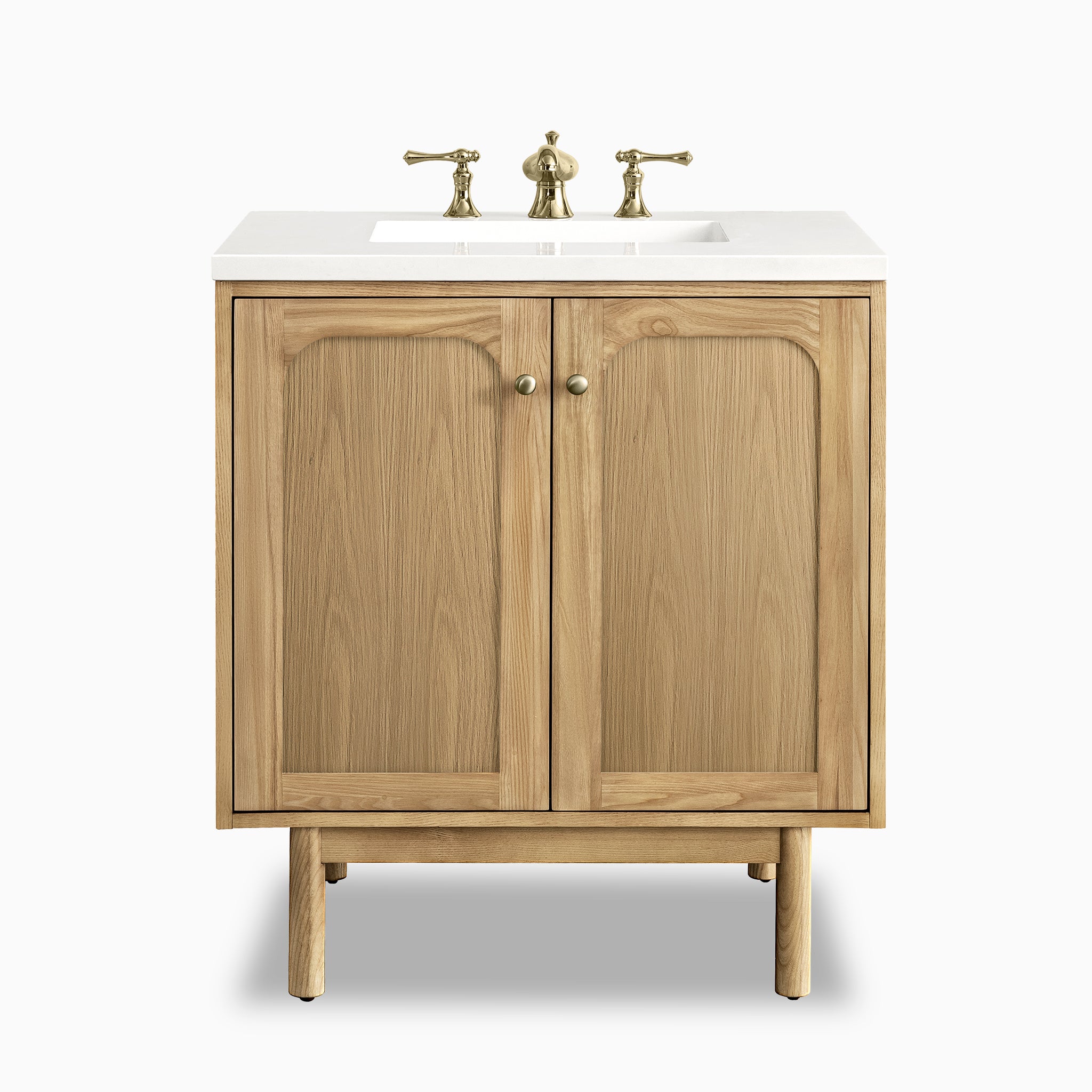 30" single vanity in light natural oak with arched panel doors and elegant brass hardware for a soft vintage charm.