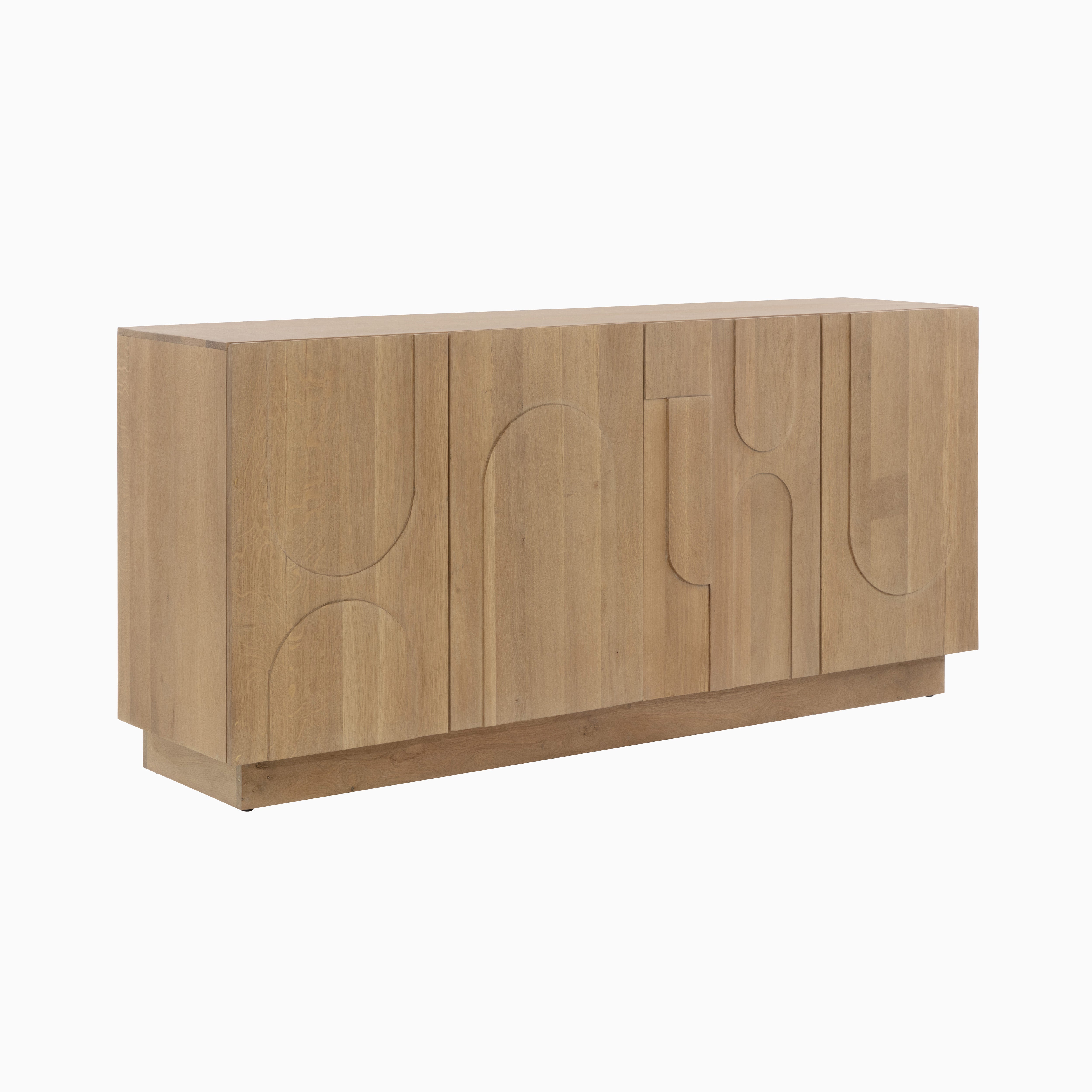 Light oak-finished sideboard featuring abstract relief patterns across the doors, blending organic texture with modern function.