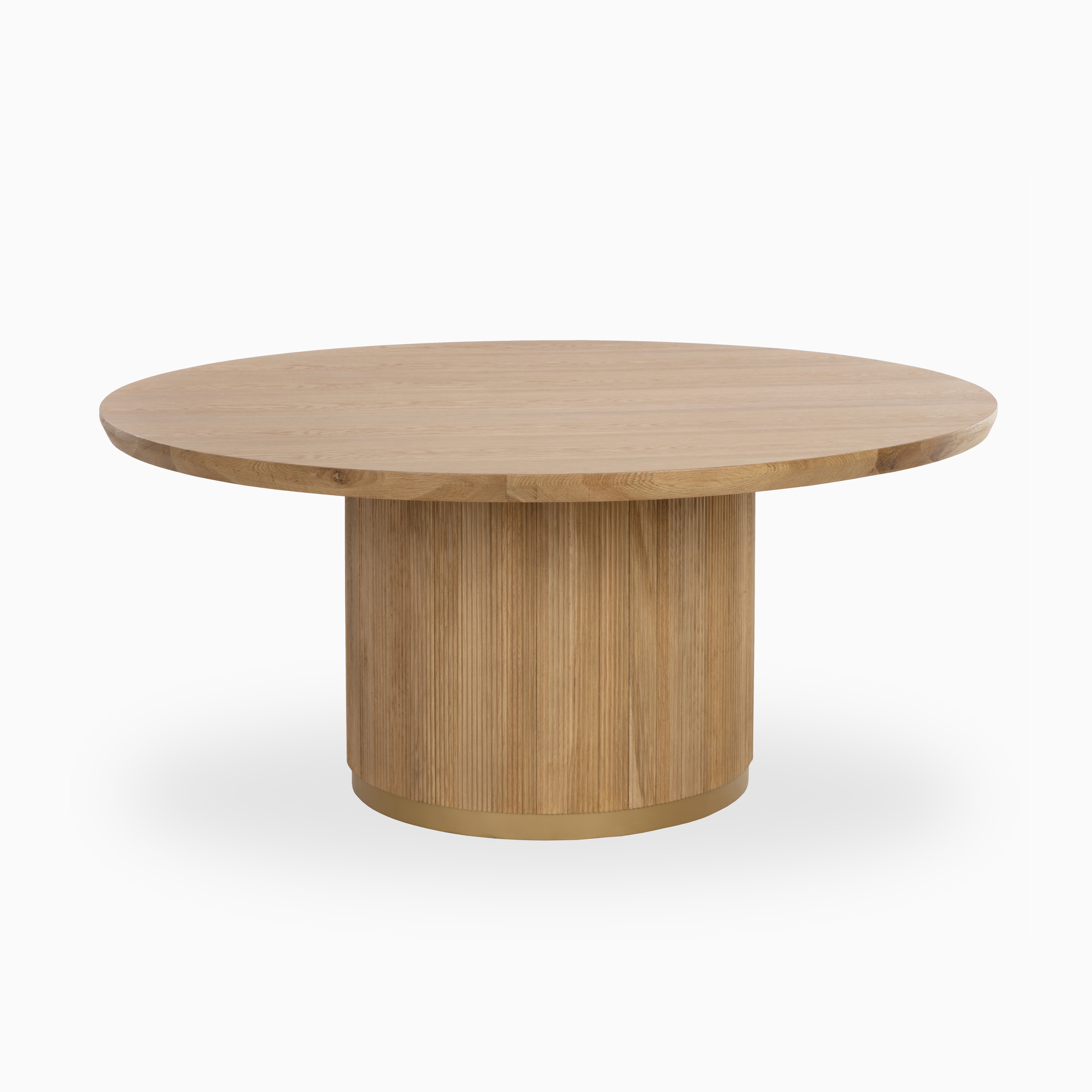 Round 68-inch dining table in rustic oak with a smooth wood top and cylindrical ribbed base, offering natural warmth and modern elegance.
