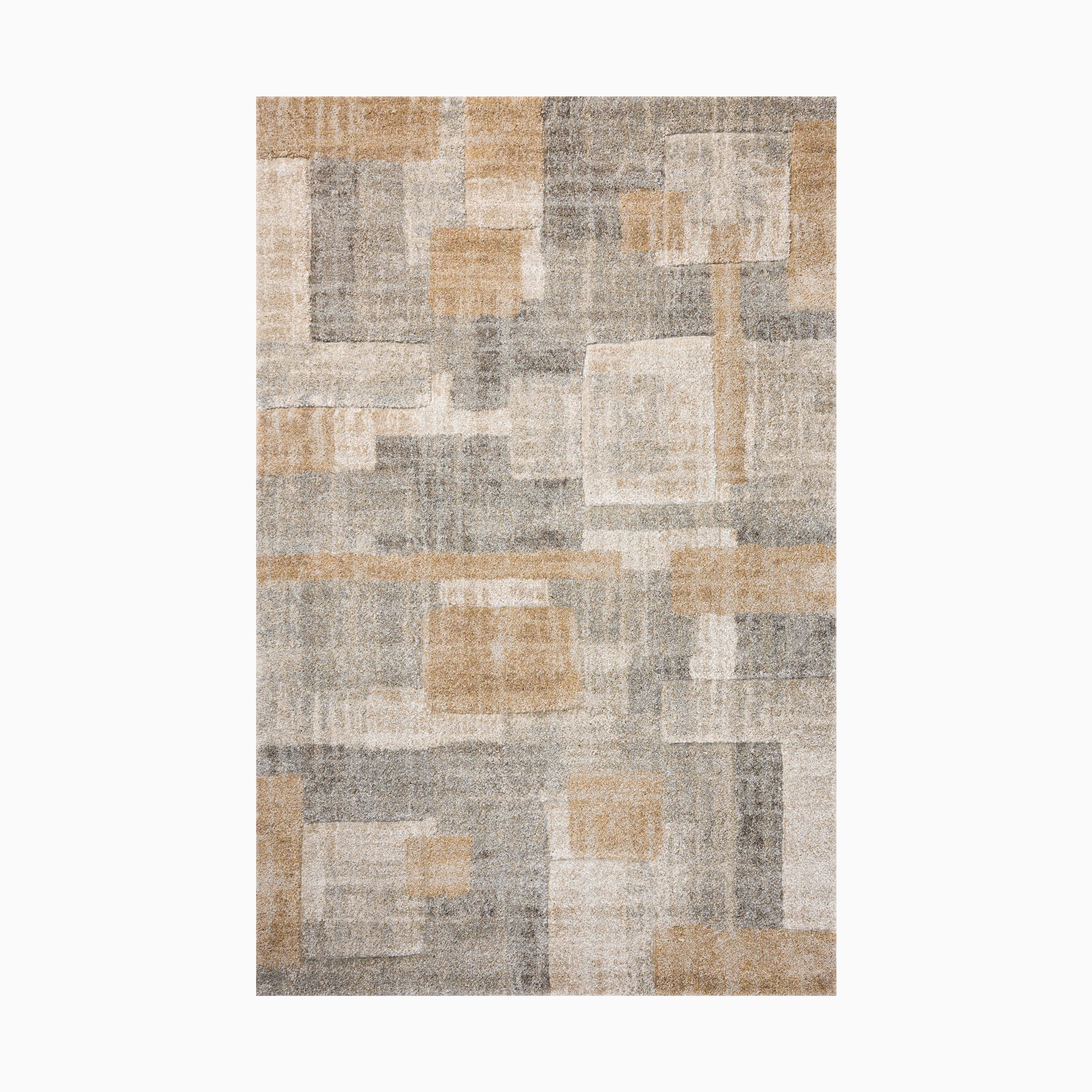 Power loomed area rug from Egypt made of polypropylene, featuring an abstract geometric design in warm beige, gray, and taupe tones.