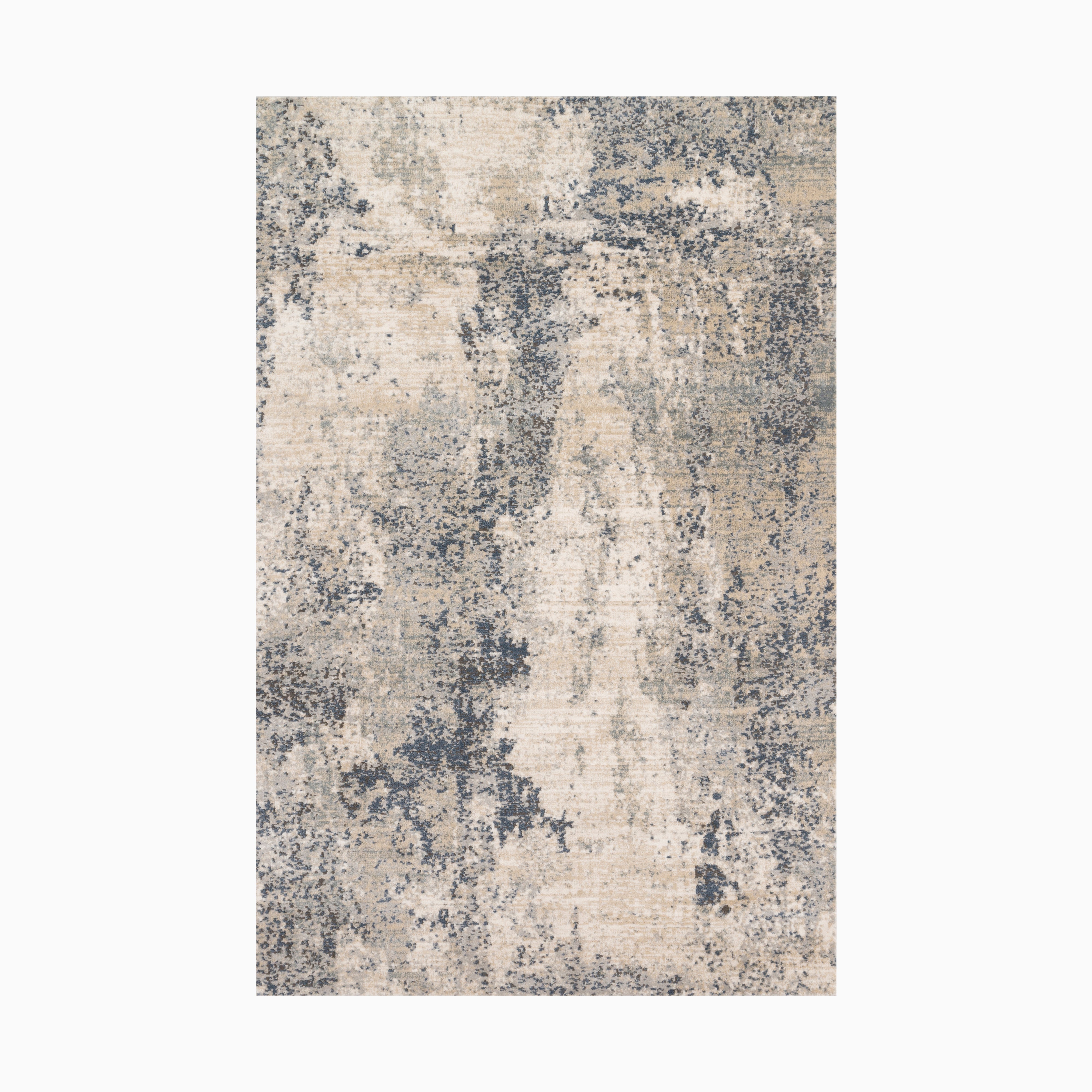 Power loomed area rug made of polypropylene and polyester, featuring a distressed design in soft beige, ivory, and deep blue tones, creating a modern yet vintage-inspired look.