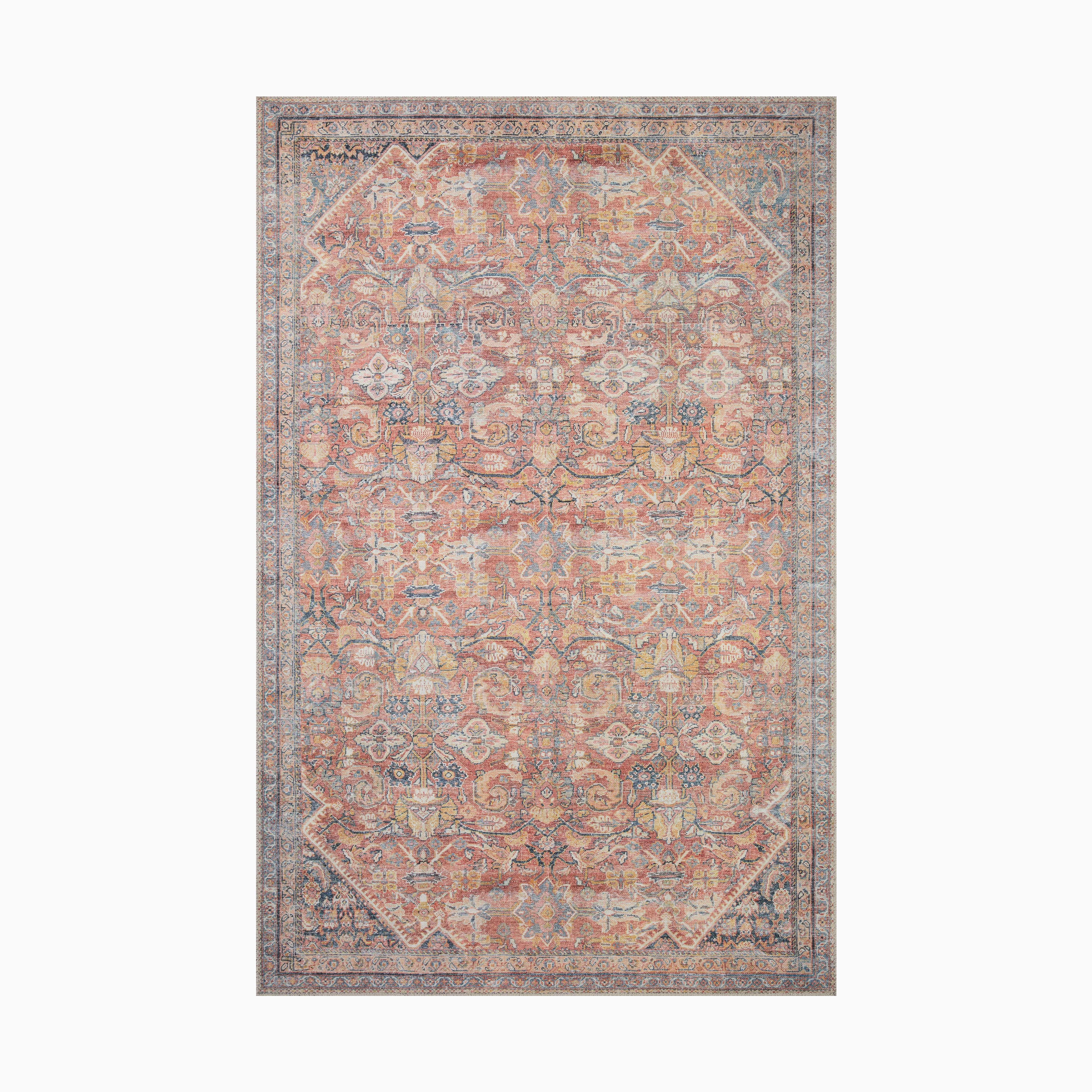 Distressed Persian-style power loomed rug made of polyester with intricate floral motifs in warm rust, blue, and beige hues, creating a vintage, timeworn elegance.