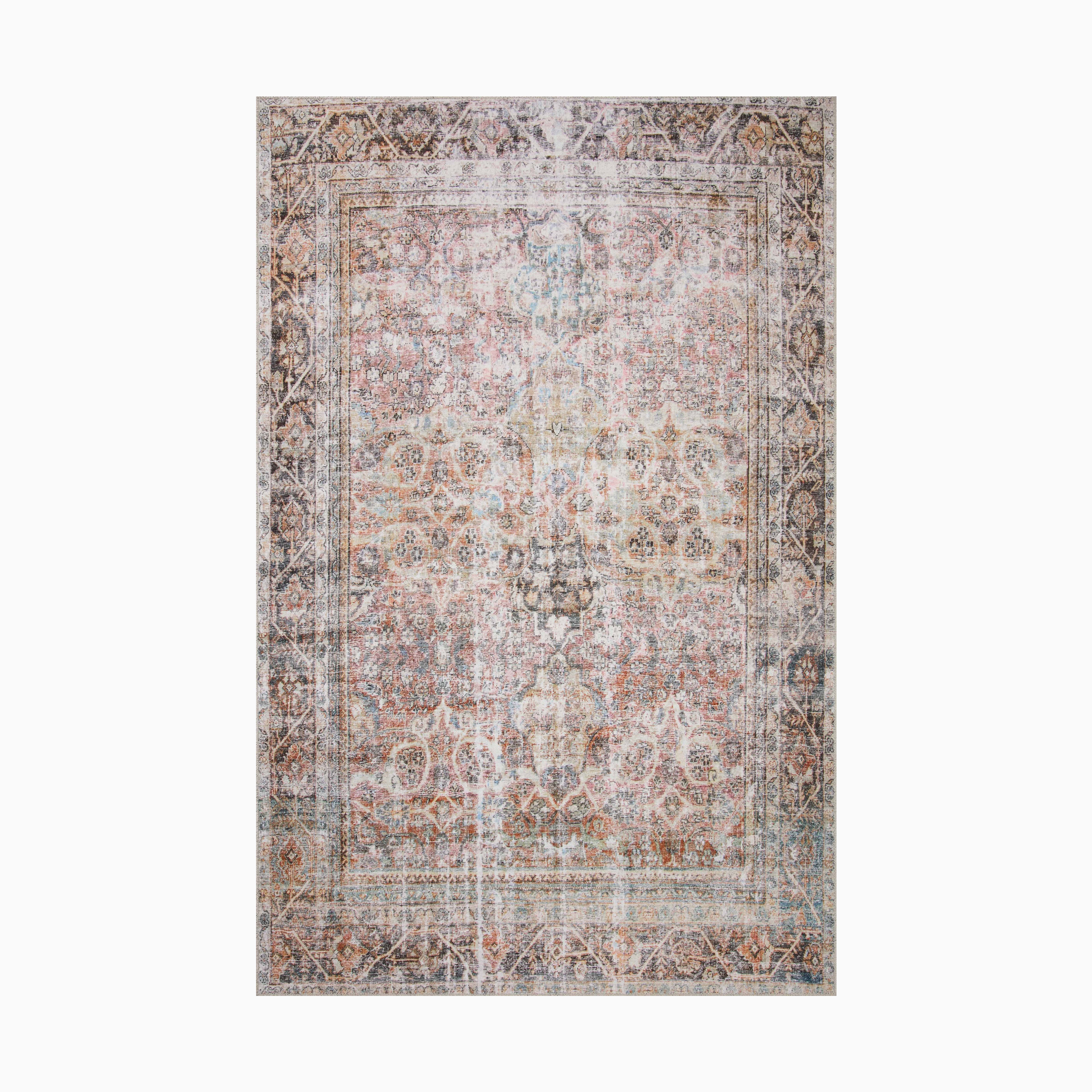 Distressed Persian-style power loomed rug made of polyester featuring an ornate medallion pattern in faded tones of rust, blue, and beige for a vintage look.