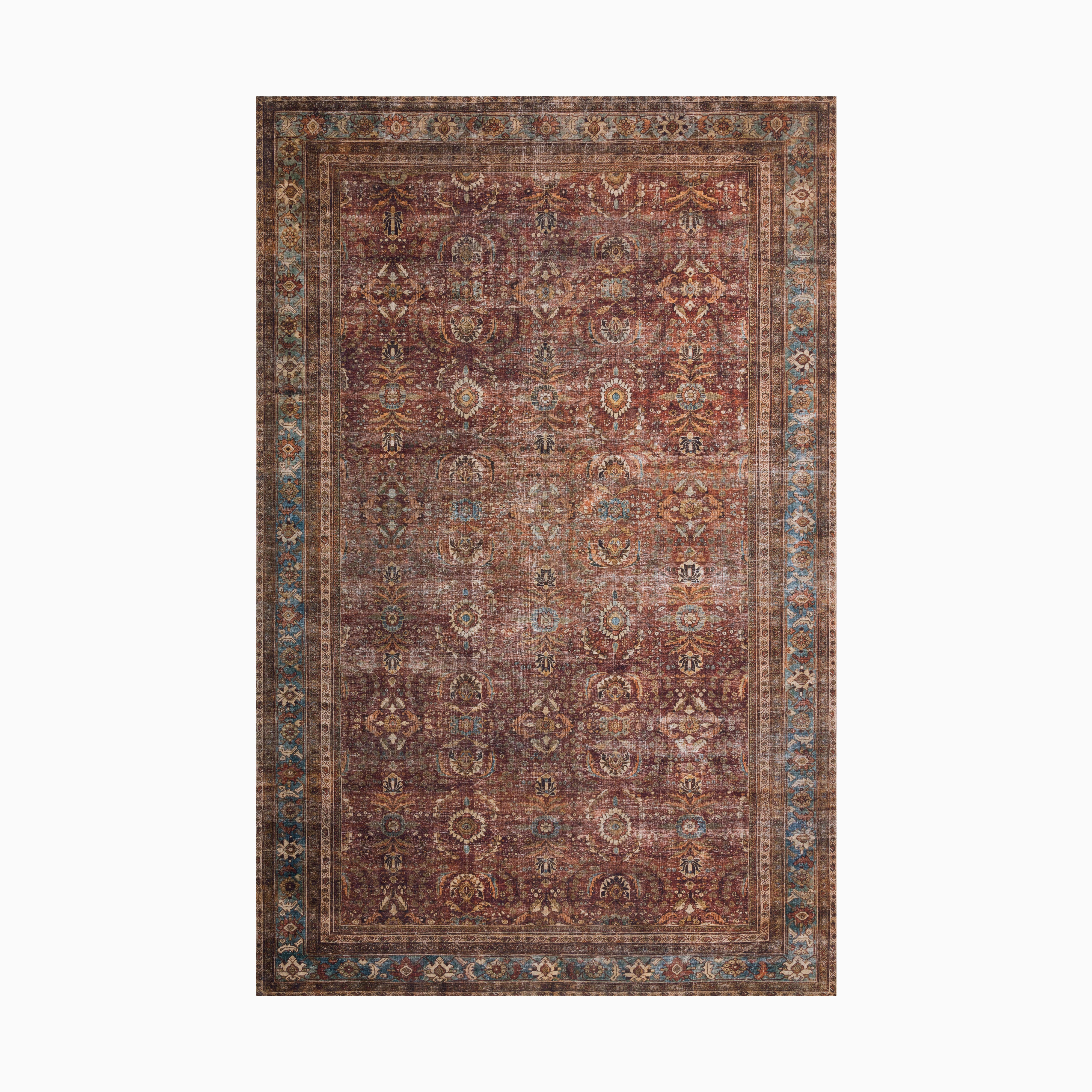 Vintage-style power loomed rug made of polyester with intricate floral motifs in rich rust, gold, and navy hues, framed by a distressed blue and beige border.