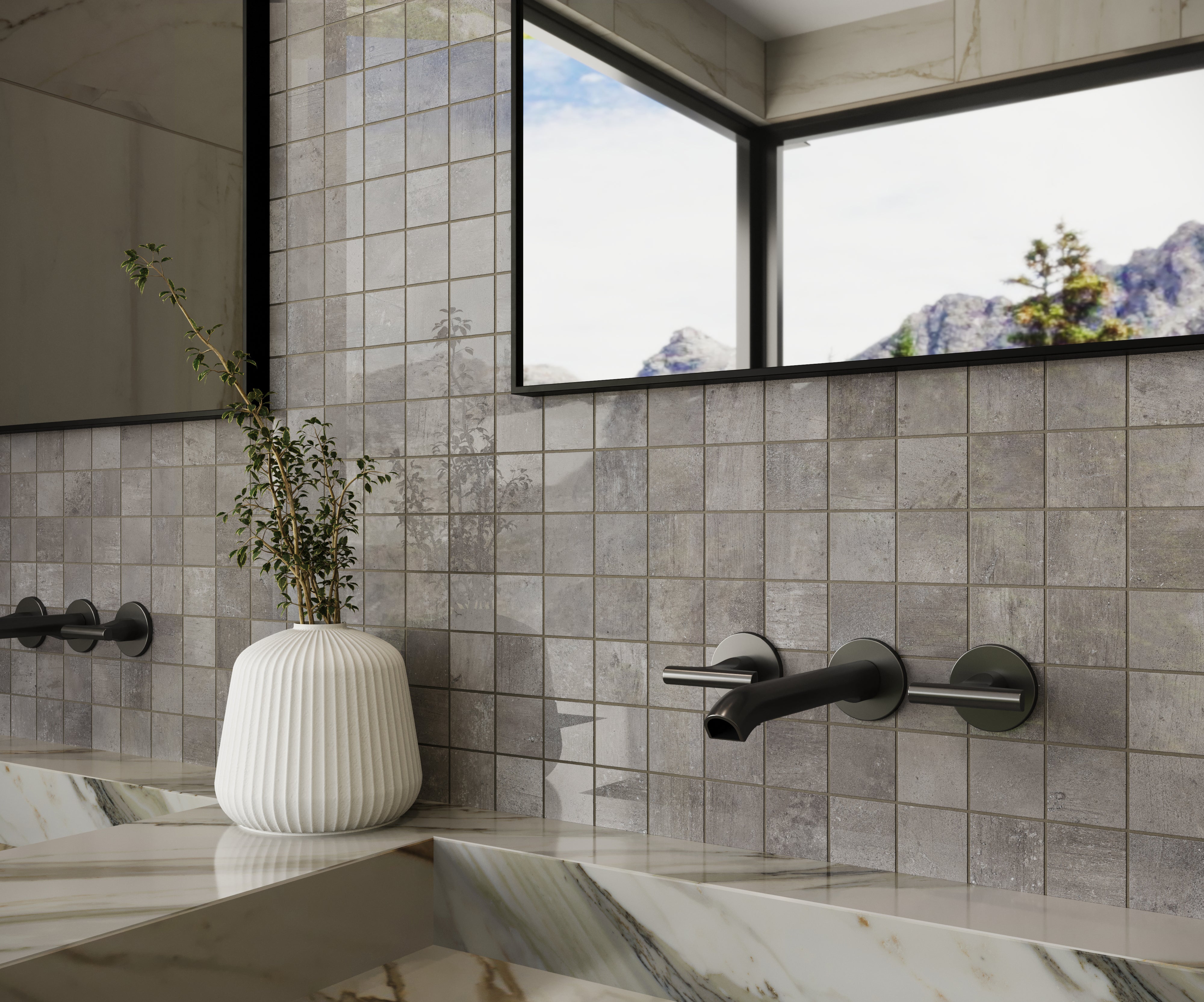 Bathroom accent wall featuring 2x2 mosaic tiles with subtle grayish-brown tones and a polished finish