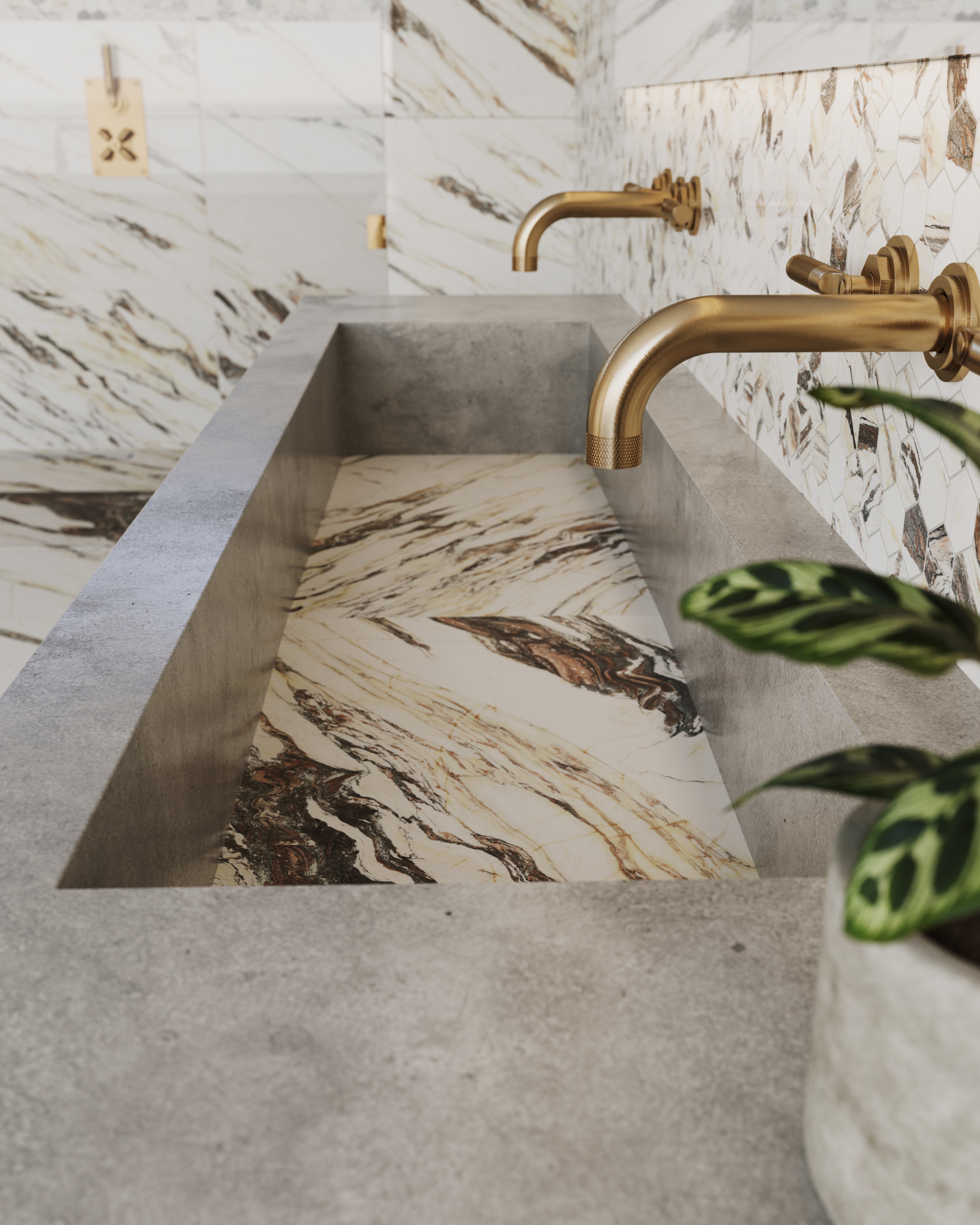 A modern bathroom featuring bold Calacatta Viola tiles with dramatic veining, paired with a sleek concrete sink and gold fixtures for a luxurious touch.