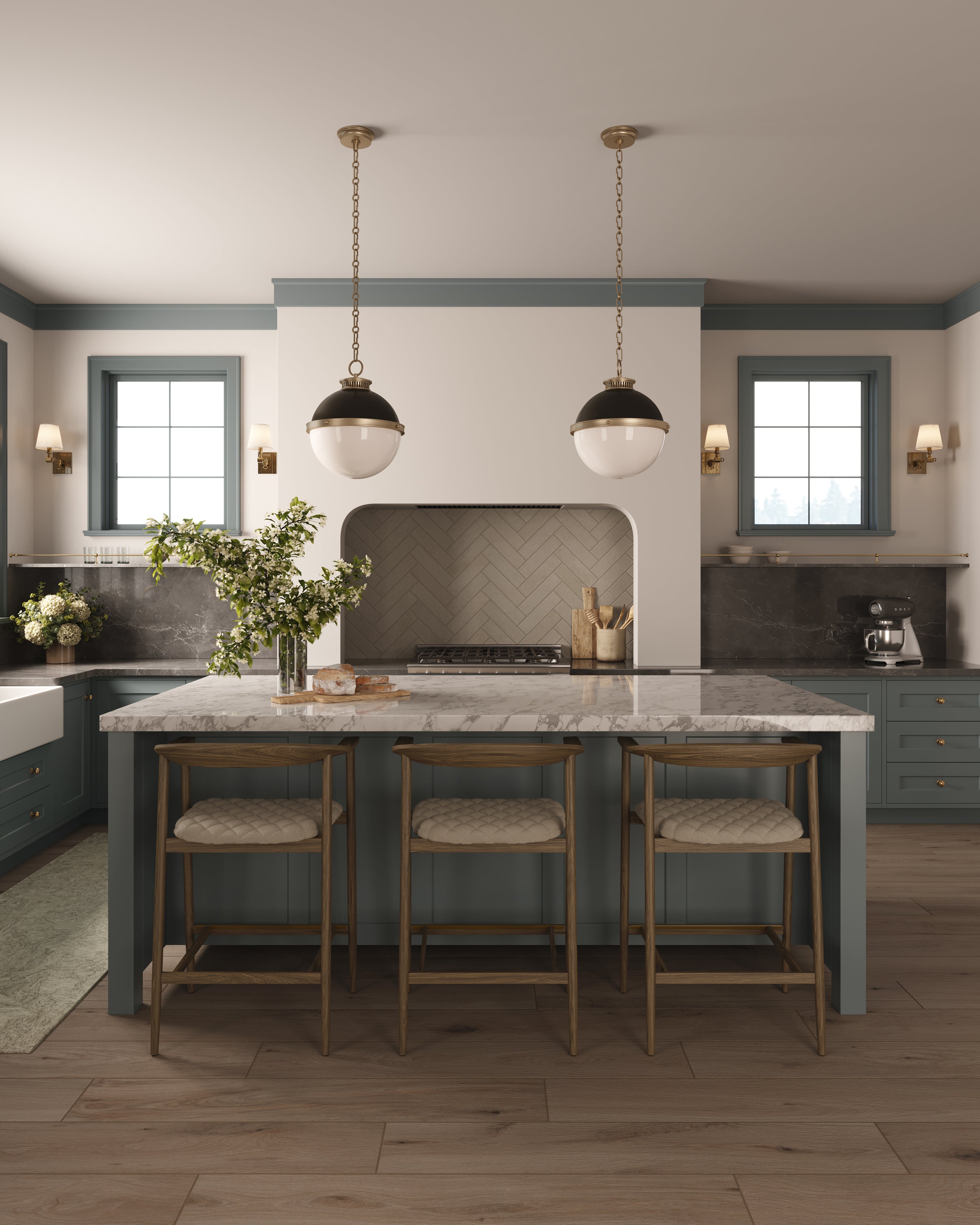 Vintage-inspired globe pendant lights with brass chains and dark metal caps hanging above the kitchen island