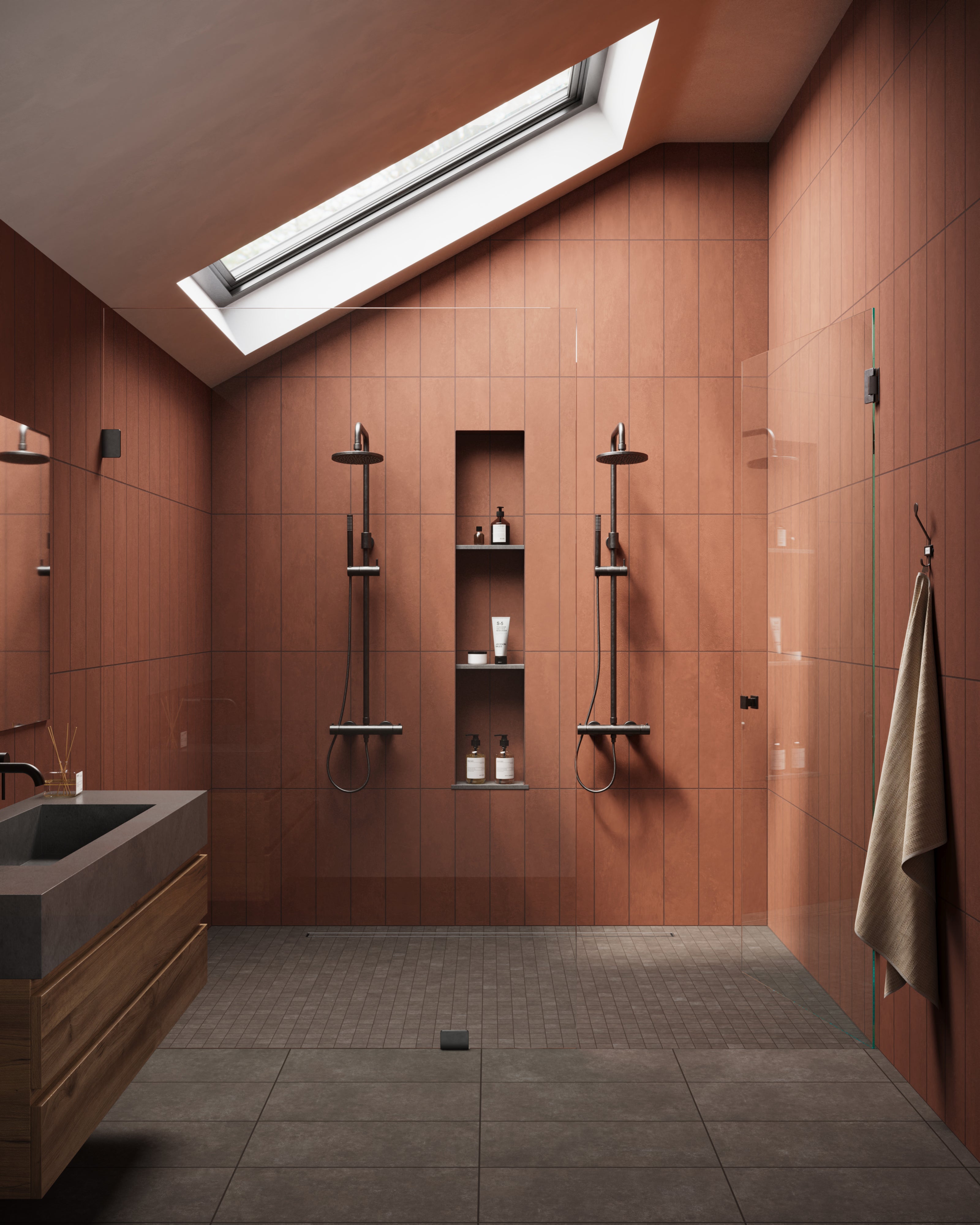 Contemporary bathroom featuring Wyatt Espresso 12x24 matte porcelain tiles on the floor, complemented by warm terracotta wall tiles and modern black fixtures, under a skylight.