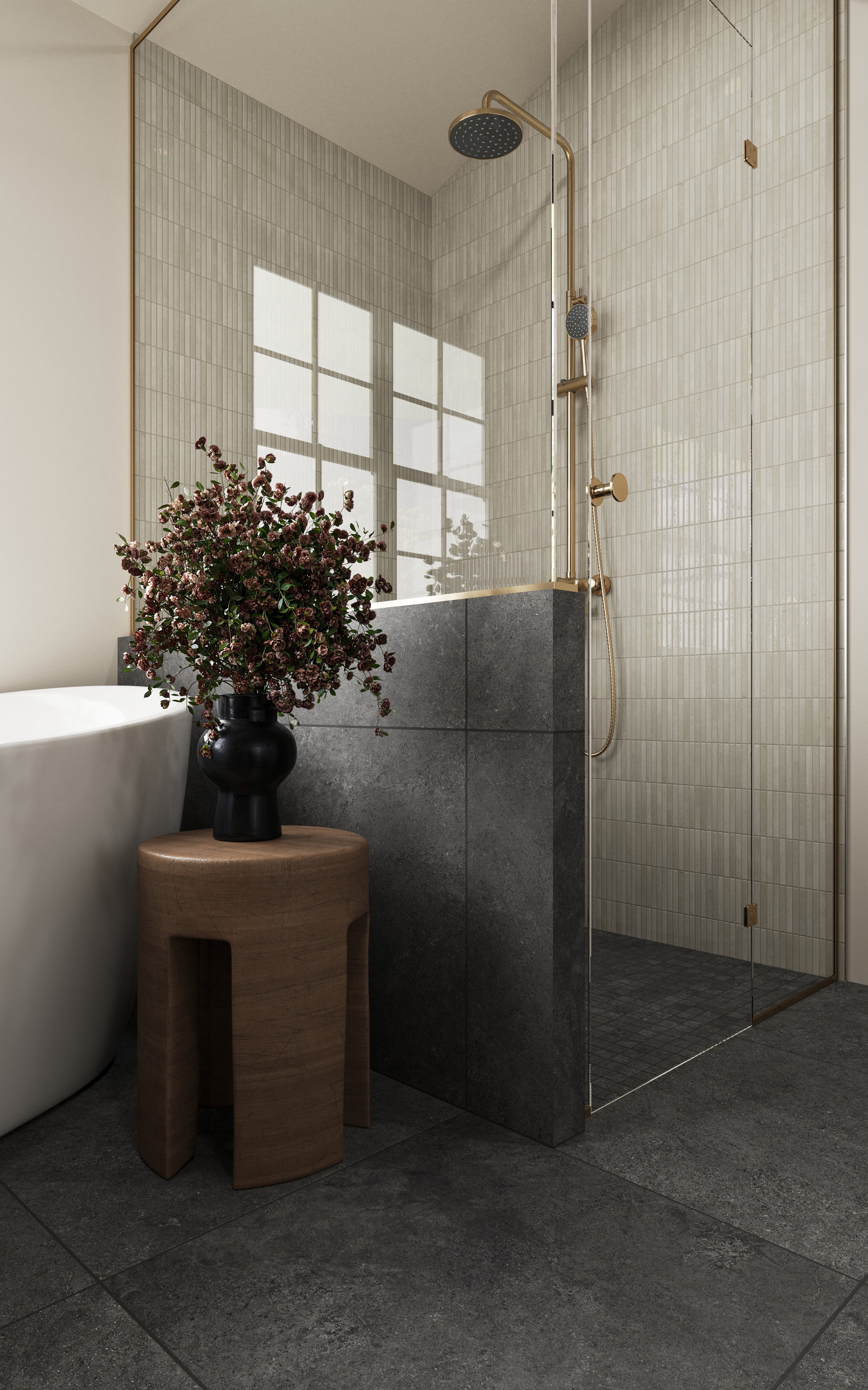 Modern bathroom featuring Adeline Midnight tiles as flooring, paired with a glass-enclosed shower and minimalist décor.