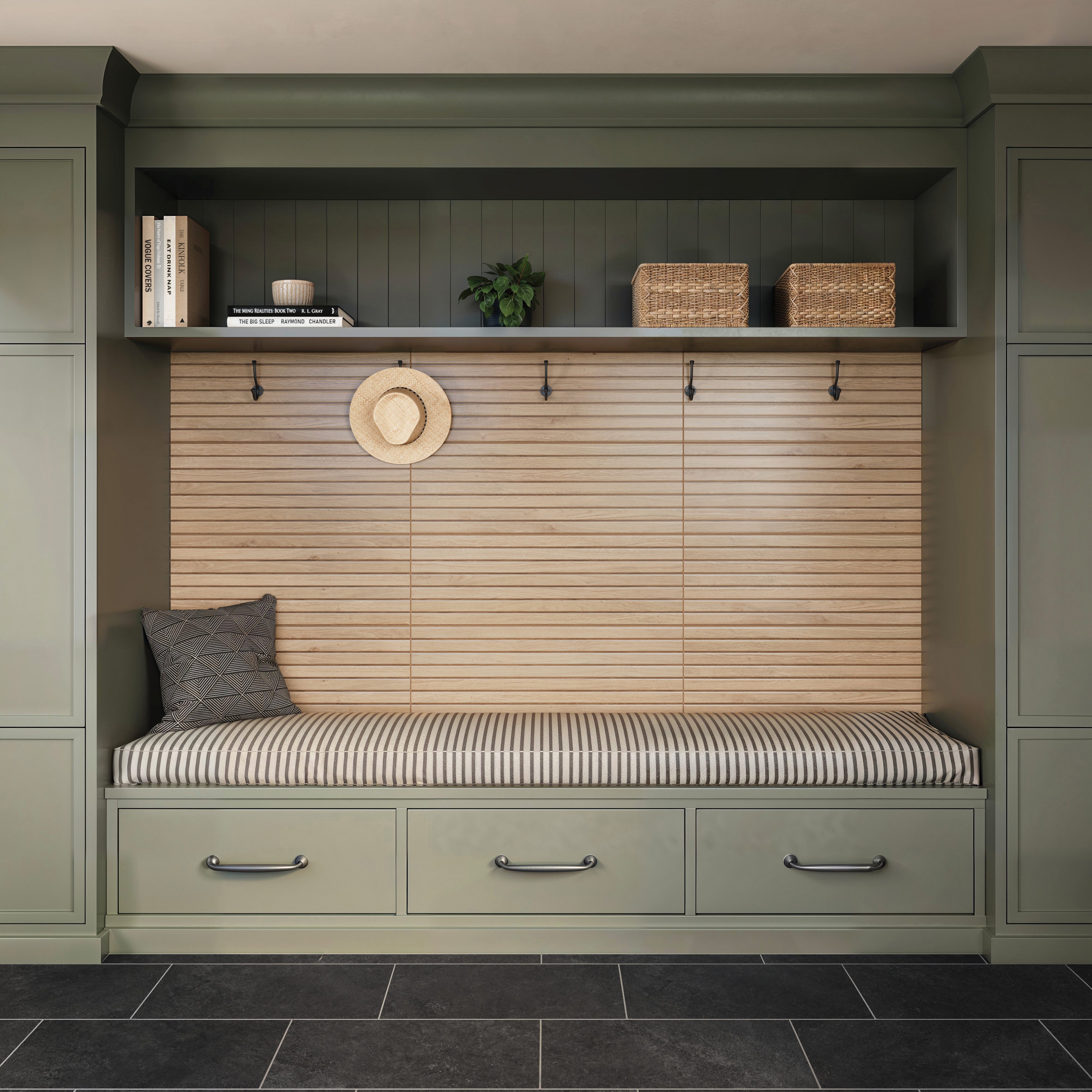 Mudroom featuring sage green built-in cabinetry, Zayne 12x36 matte ceramic tile in brown ribbed wood slats with hooks, striped cushioned seating, and charcoal matte floor tiles.