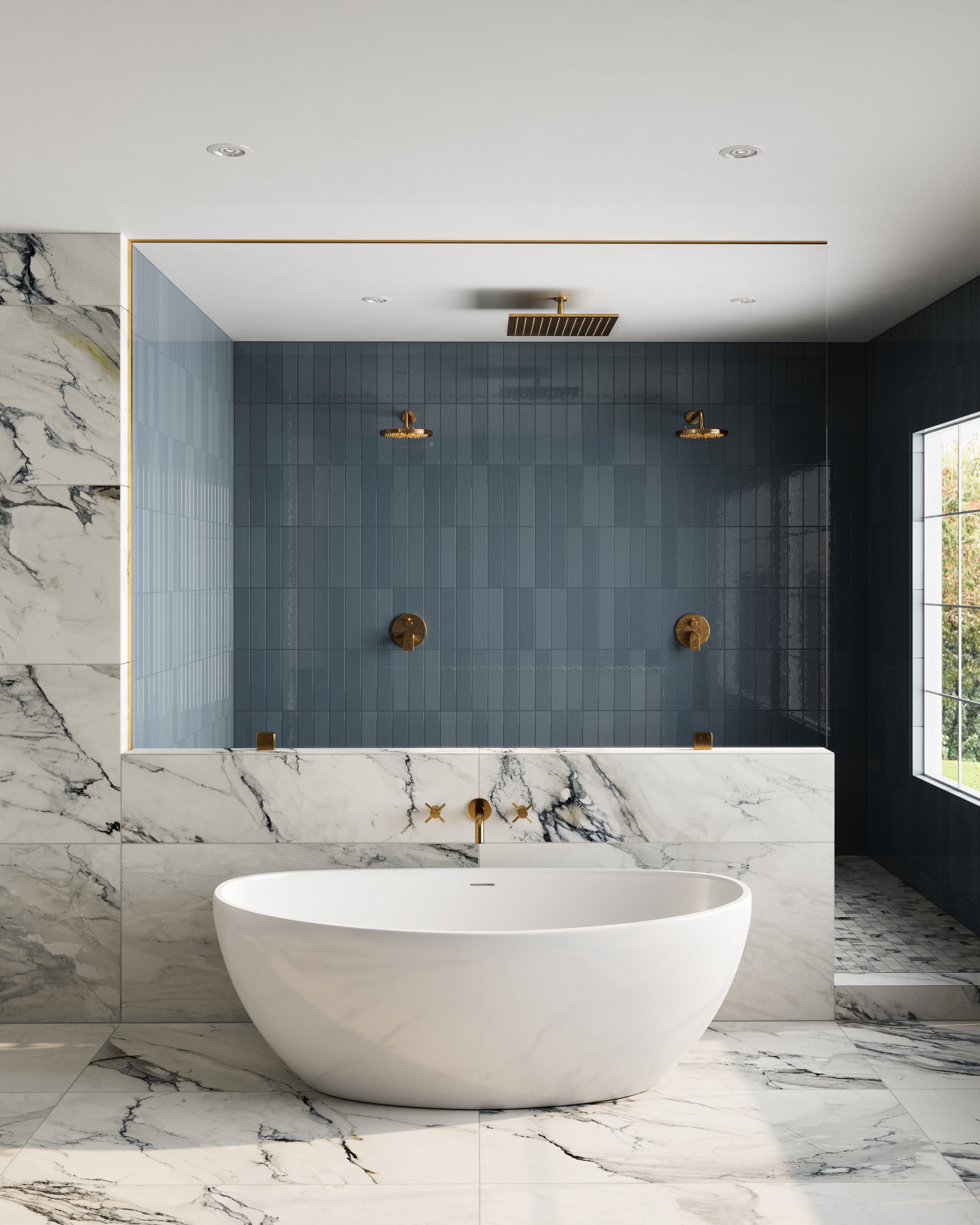 Luxurious bathroom featuring Teagan 3x12 glossy ceramic tiles in denim, paired with gold fixtures and marble accents for a sophisticated retreat.