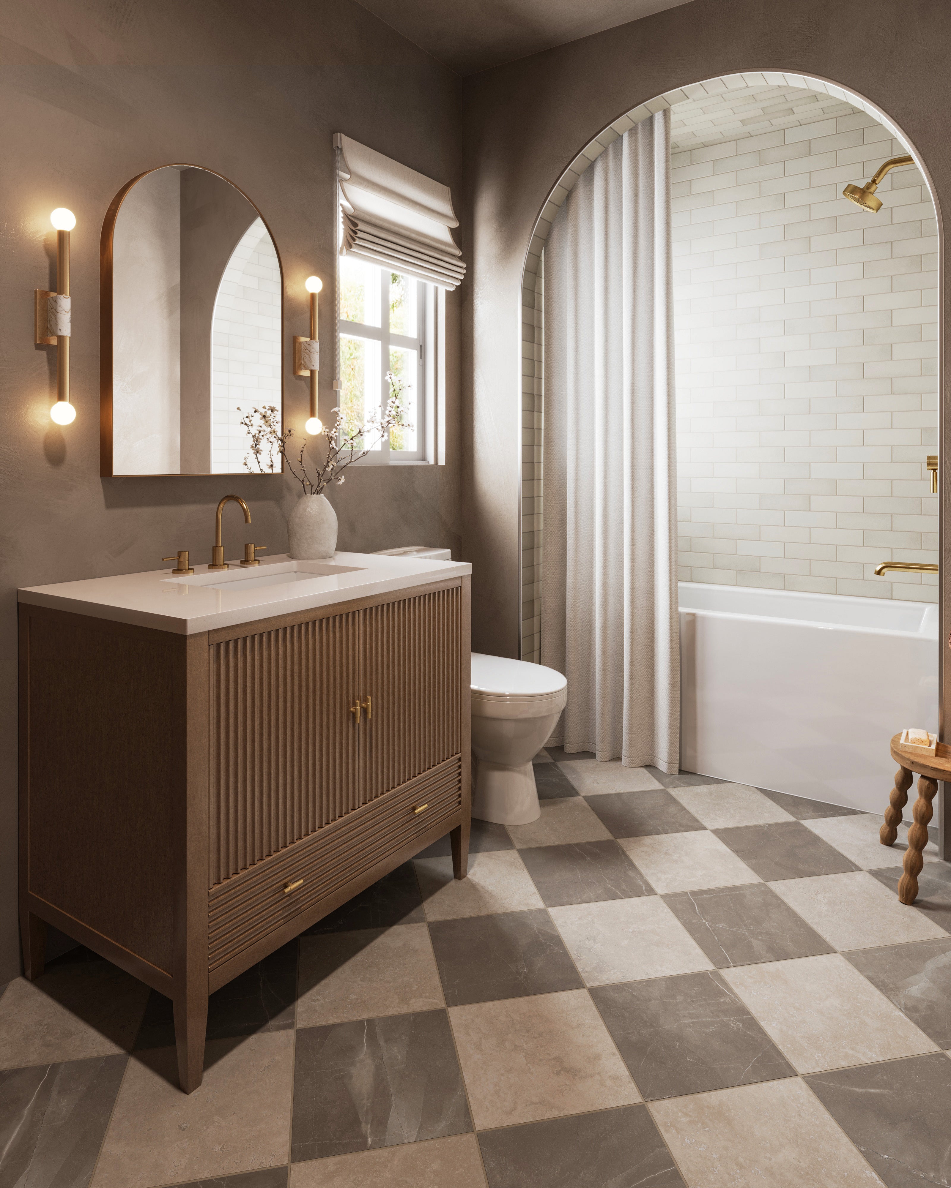 Elegant bathroom featuring single vanity in walnut, brass fixtures, and checkerboard Leona beige and brown matte floor tile.