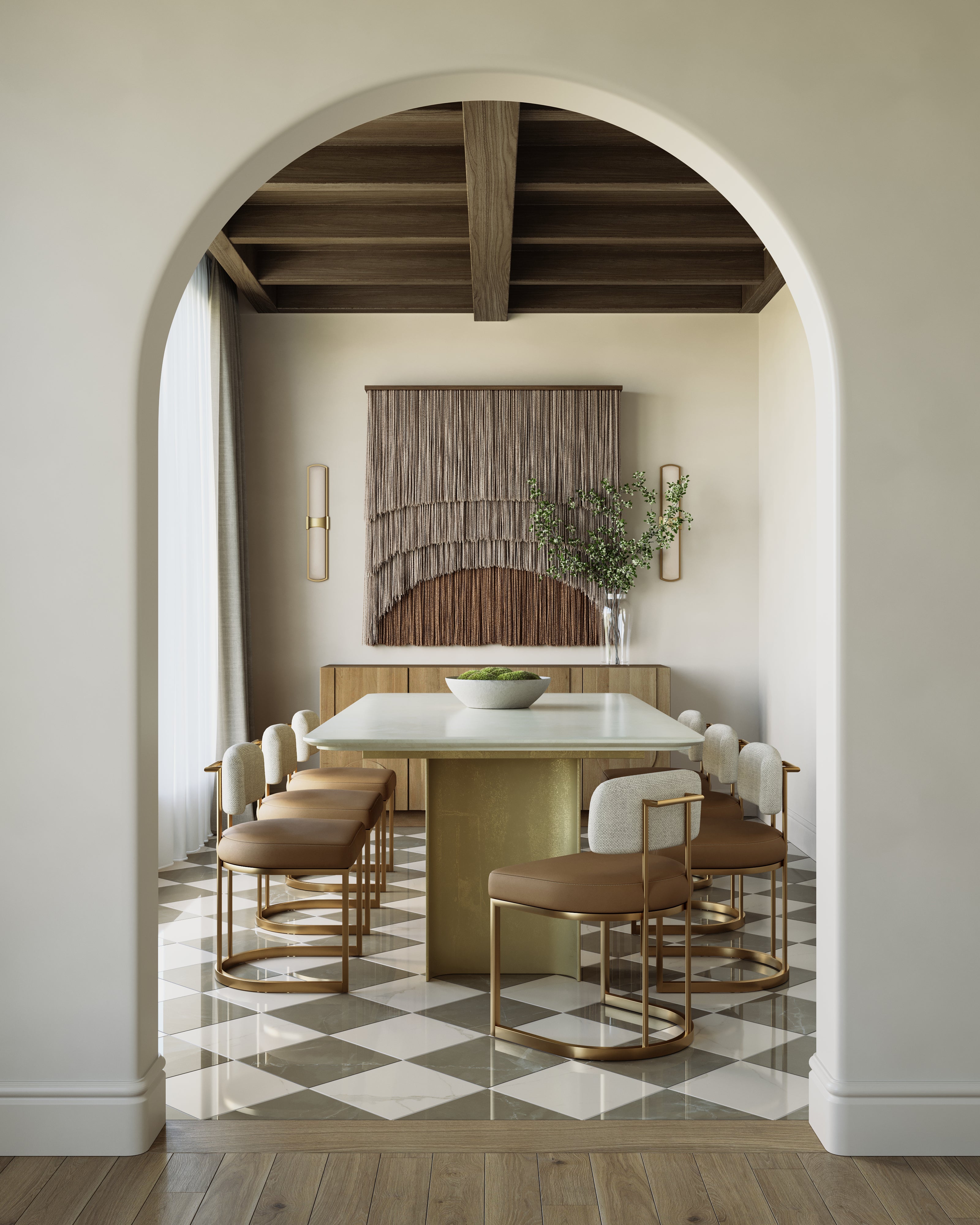 Elegant dining room with a 94.5-inch table featuring a stone top and brass base, paired with upholstered chairs and geometric flooring.