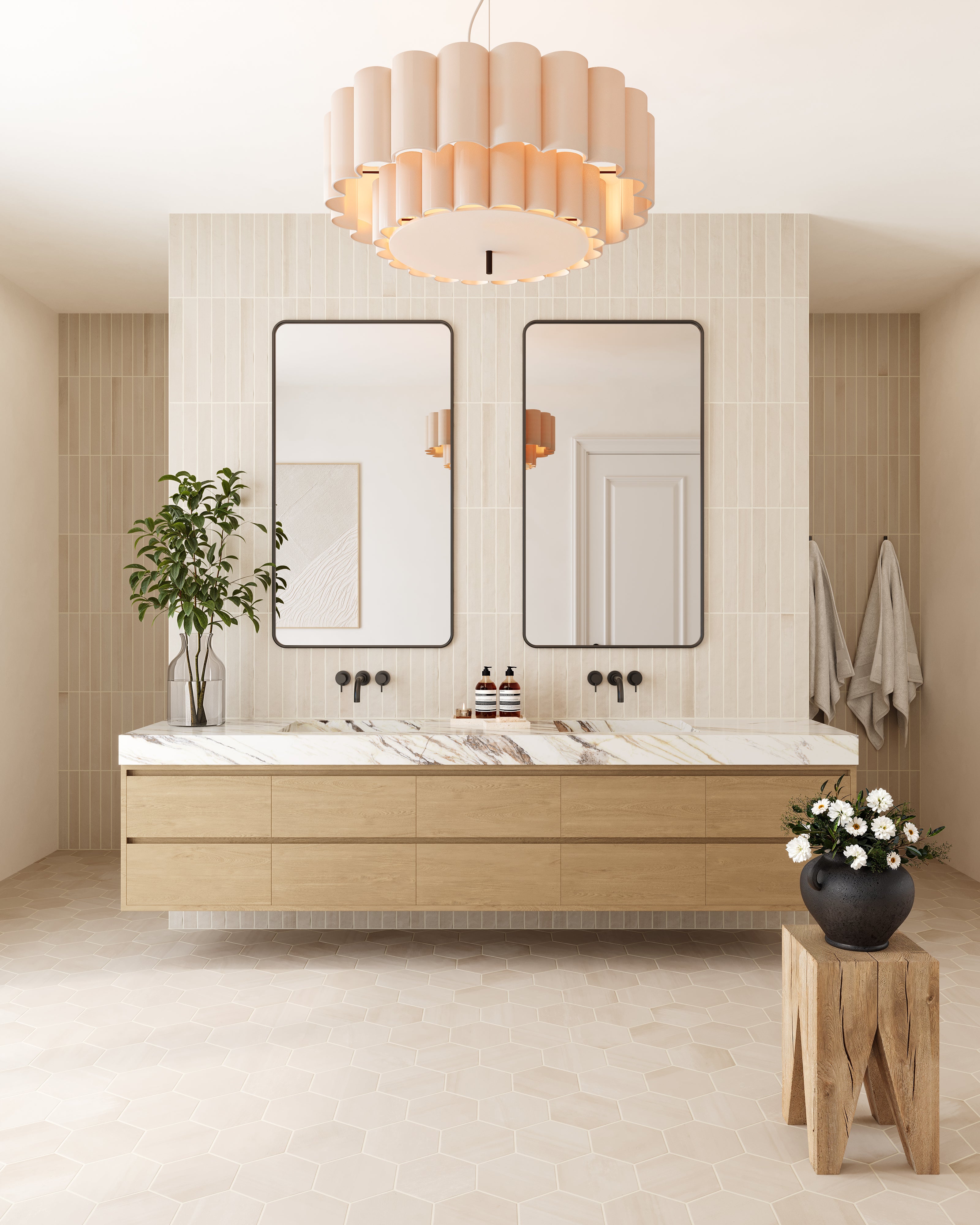 Modern vanity wall clad in Catalina 2x16 matte porcelain tile in Cream, showcasing a soft beige palette with vertical layout for added height.
