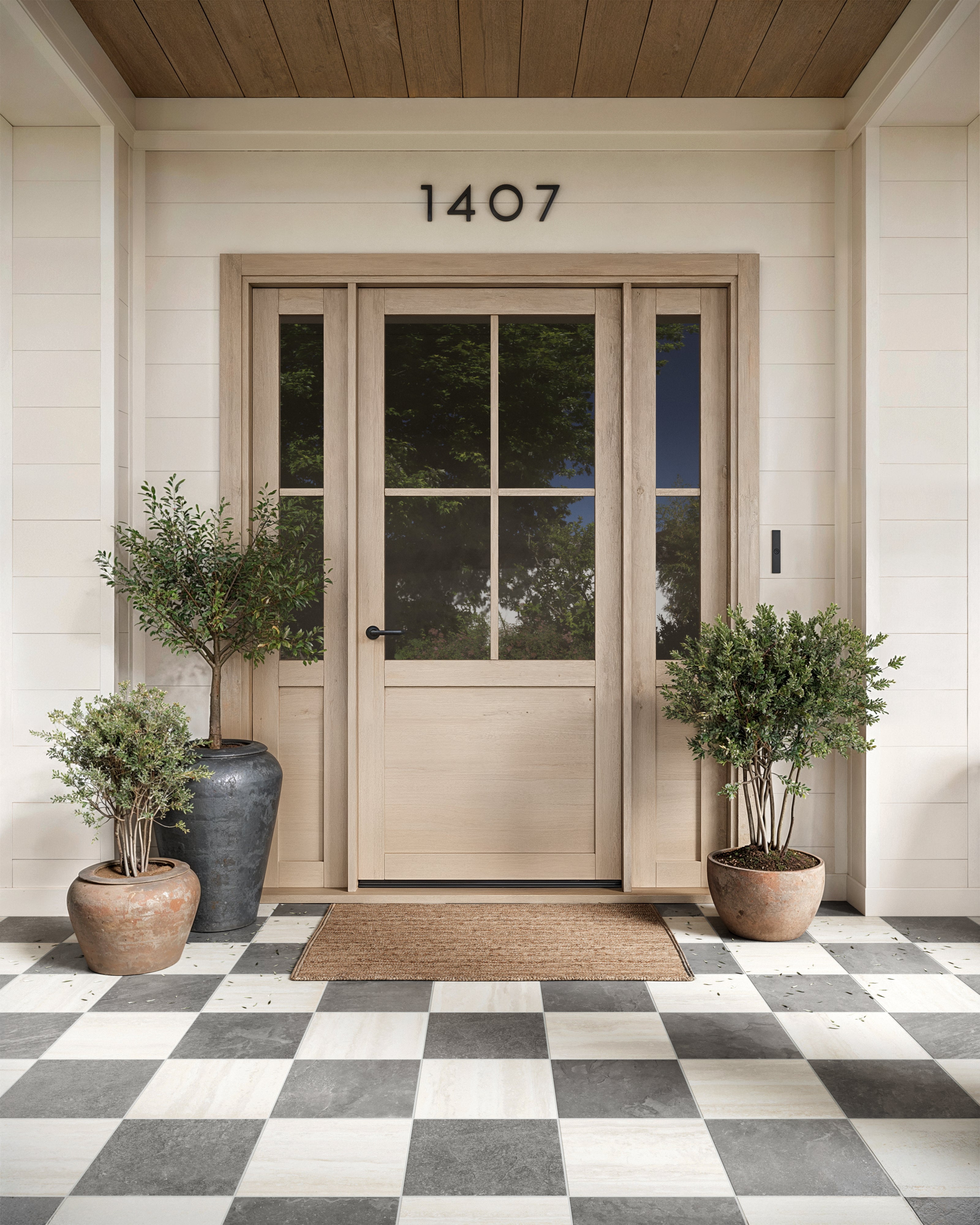 Checkerboard porcelain pavers in dark gray and beige create a bold stone look entryway with slip-resistant texture and timeless earth tones.