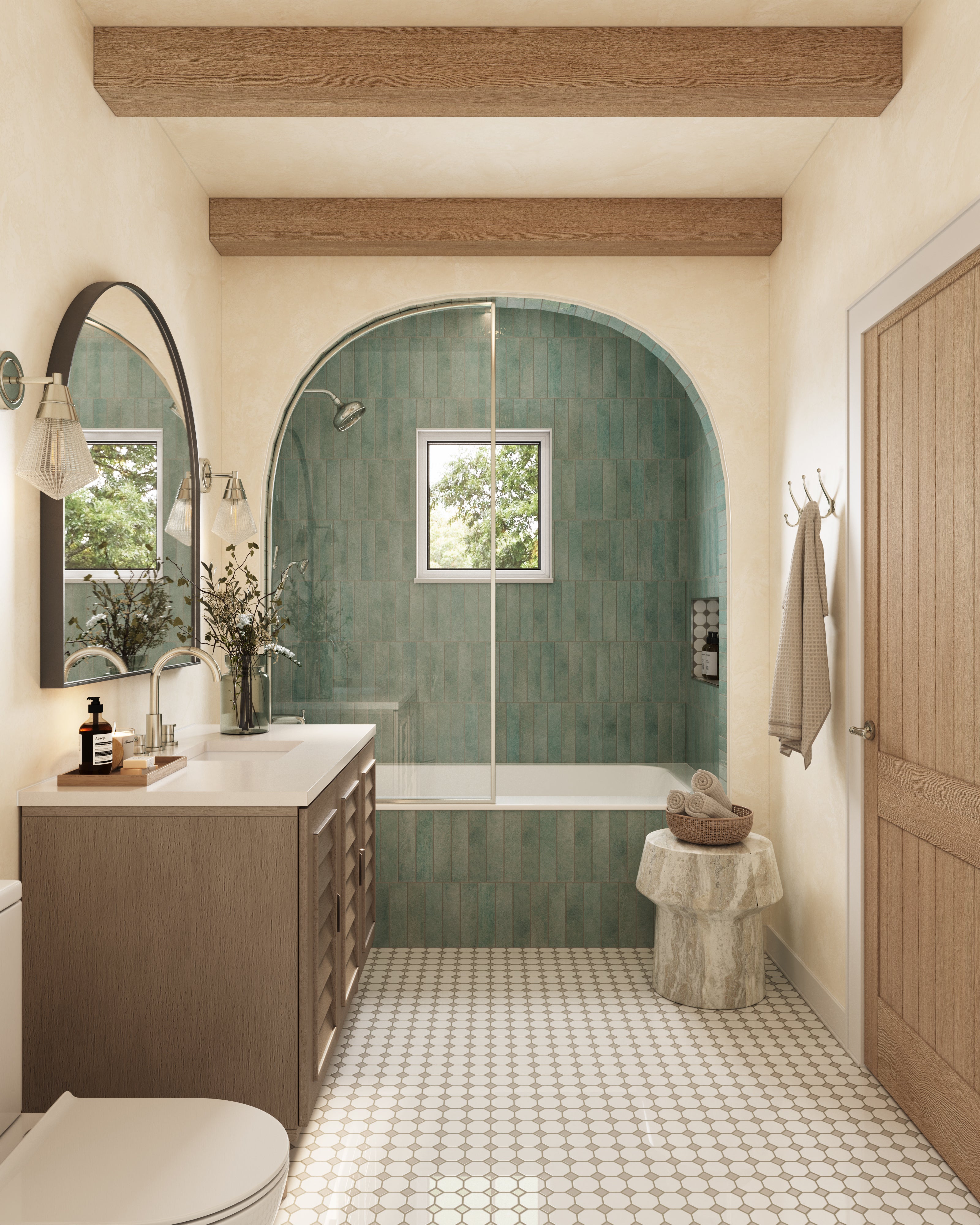 A softly arched shower wrapped in seafoam glossy porcelain tiles, where elongated vertical pieces and tonal variation create a calm, Mediterranean-inspired bathroom retreat.