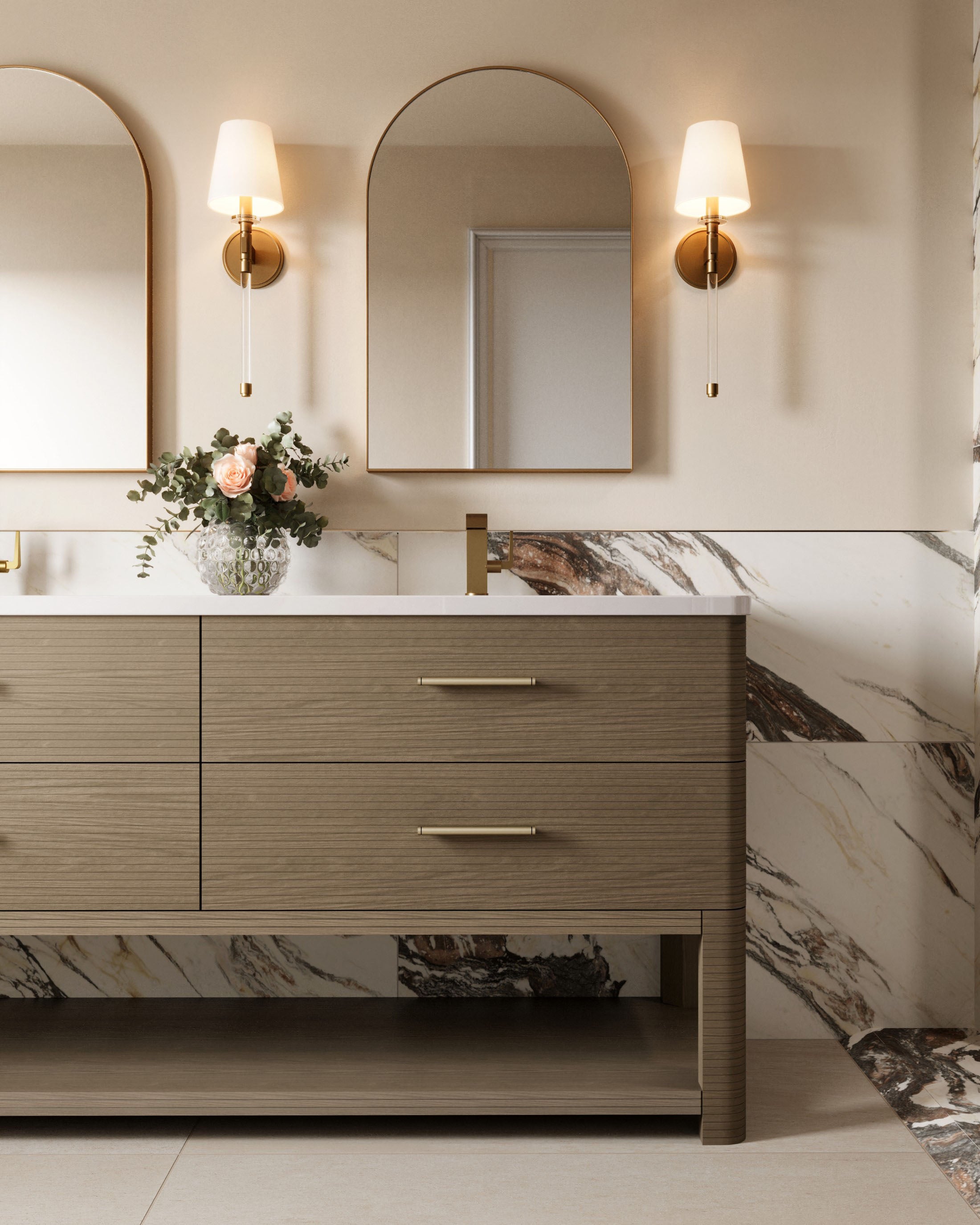 A close view of the Paxton 72" Double Vanity in Pebble Oak with 3 cm White Zeus Quartz Top, shown with twin mirrors, marble backsplash, and brass wall sconces.