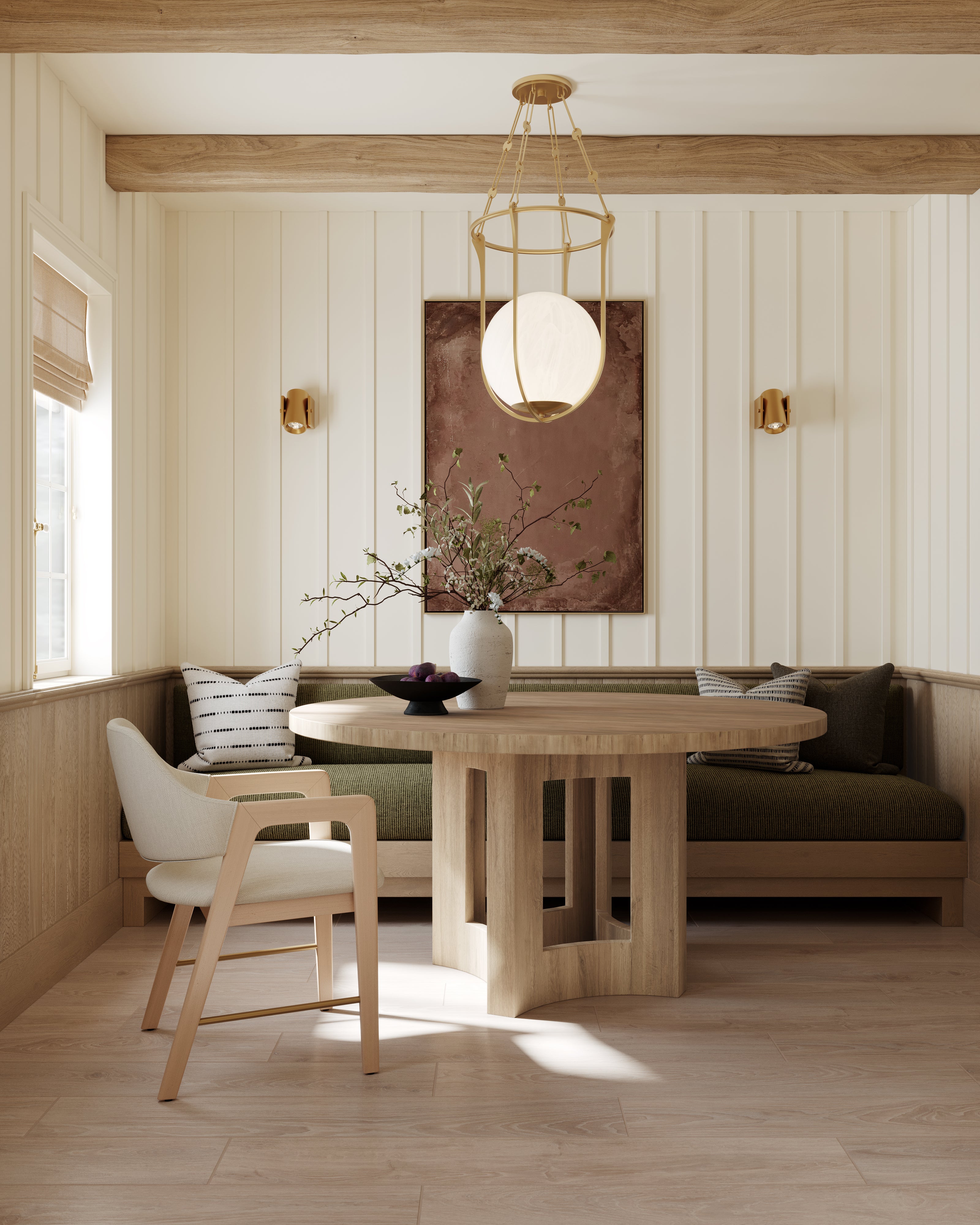 Dining nook with a 60-inch natural wood table featuring a geometric base, built-in bench seating, neutral accents, and modern lighting.