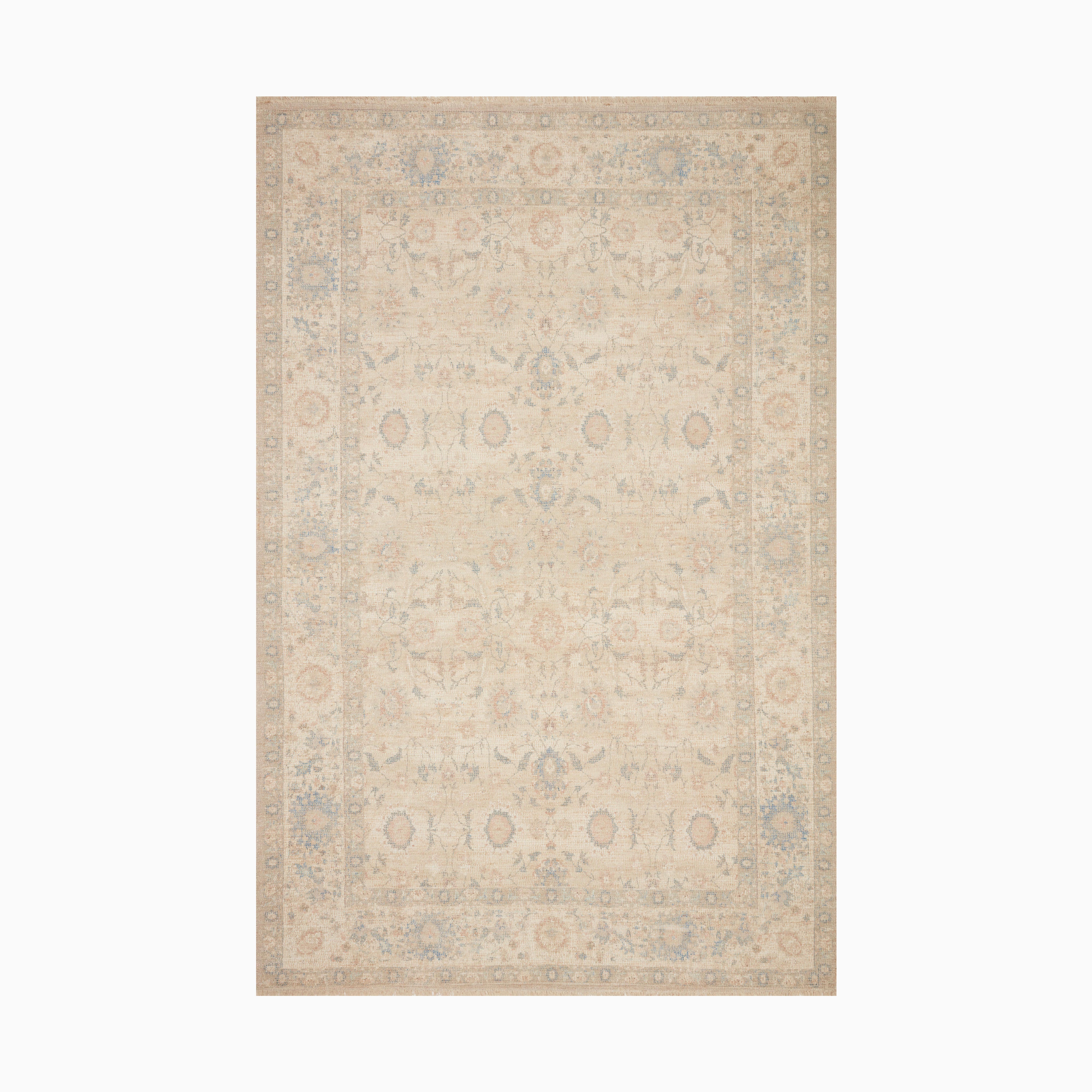 Hand-woven transitional rug made from a polyester-cotton blend, featuring a soft brick red base with muted blue and beige undertones.